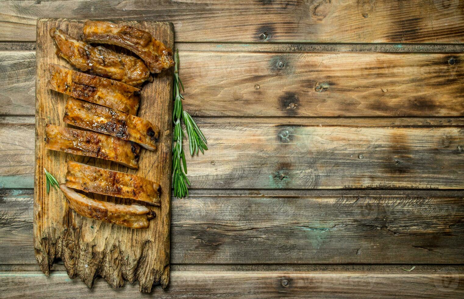 Sliced grilled ribs . photo