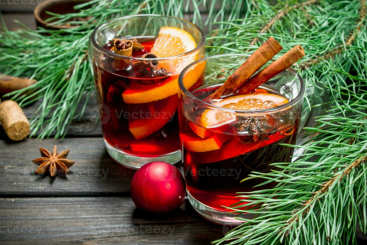Christmas hot mulled wine with spices and aromatic herbs. photo