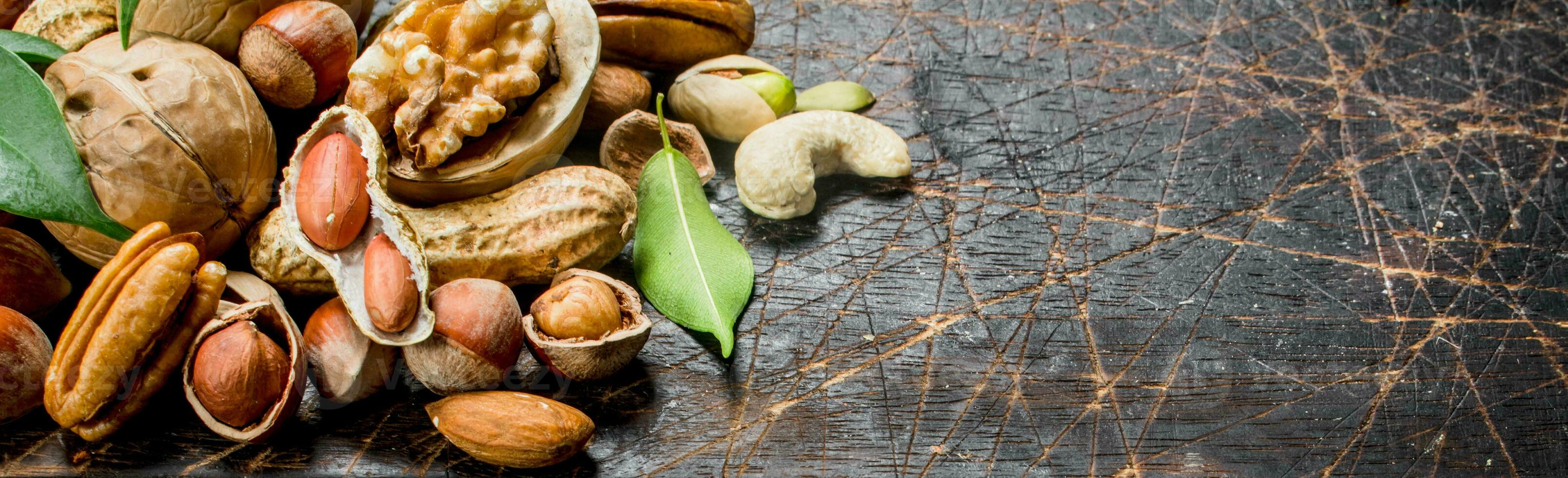 Nuts background. Different Range of natural nuts . photo