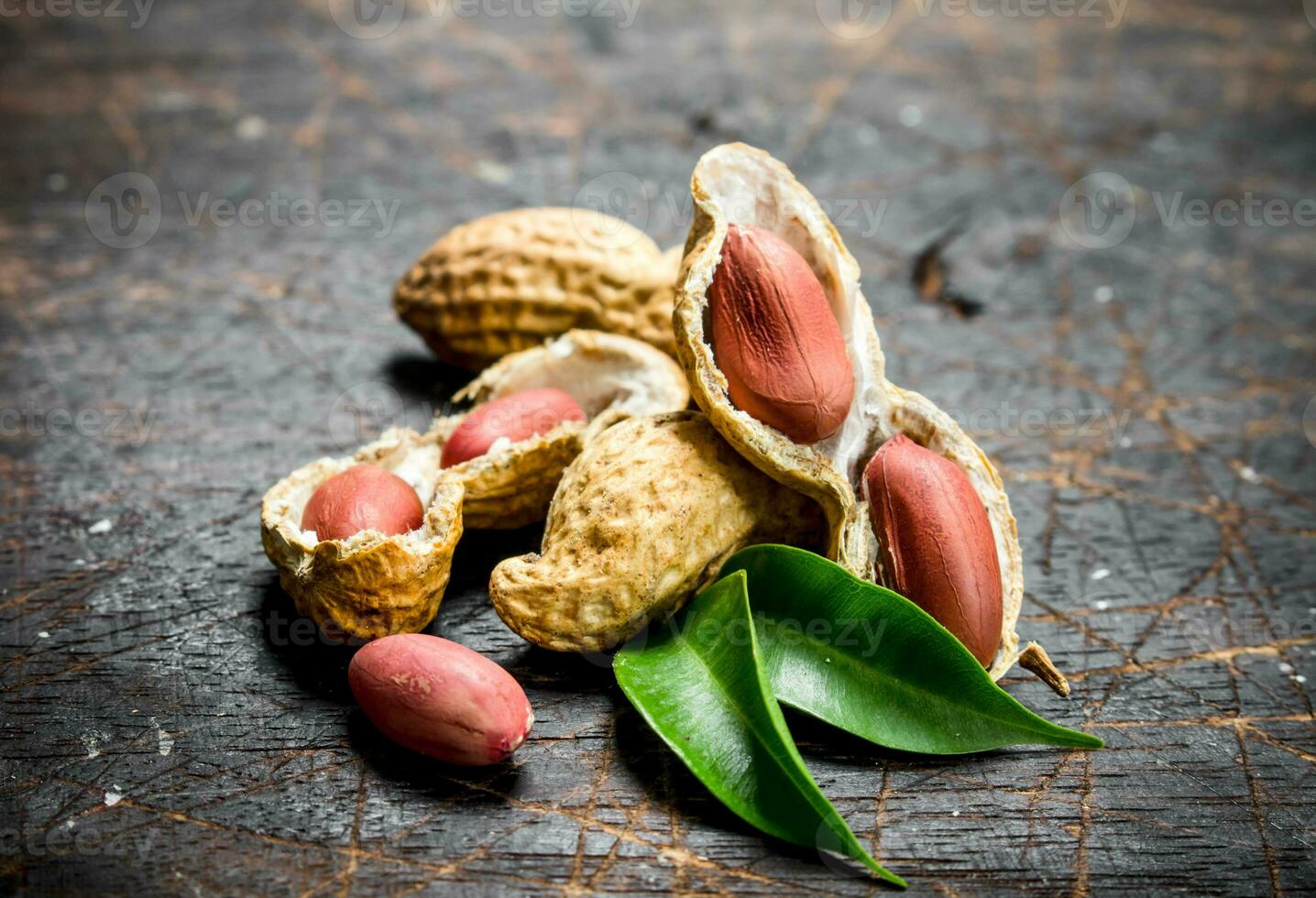 Peanuts with green leaves . photo