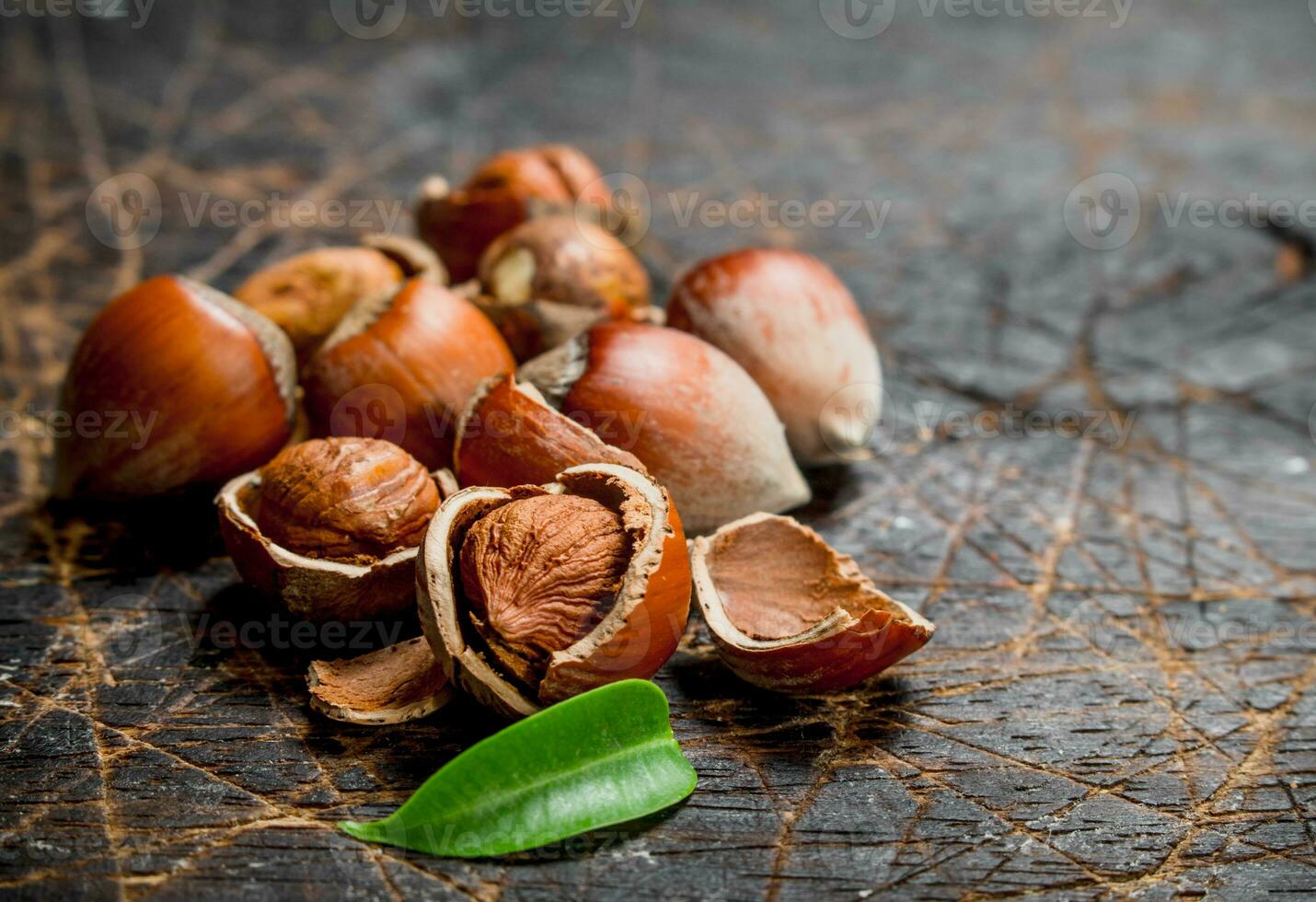 Hazelnut with green leaves . photo