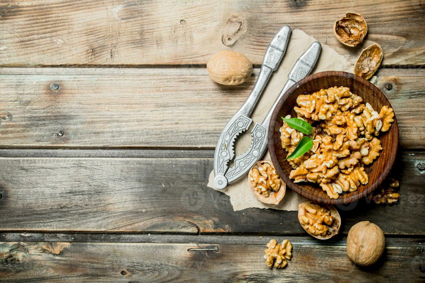 Shelled walnuts with a Nutcracker. photo