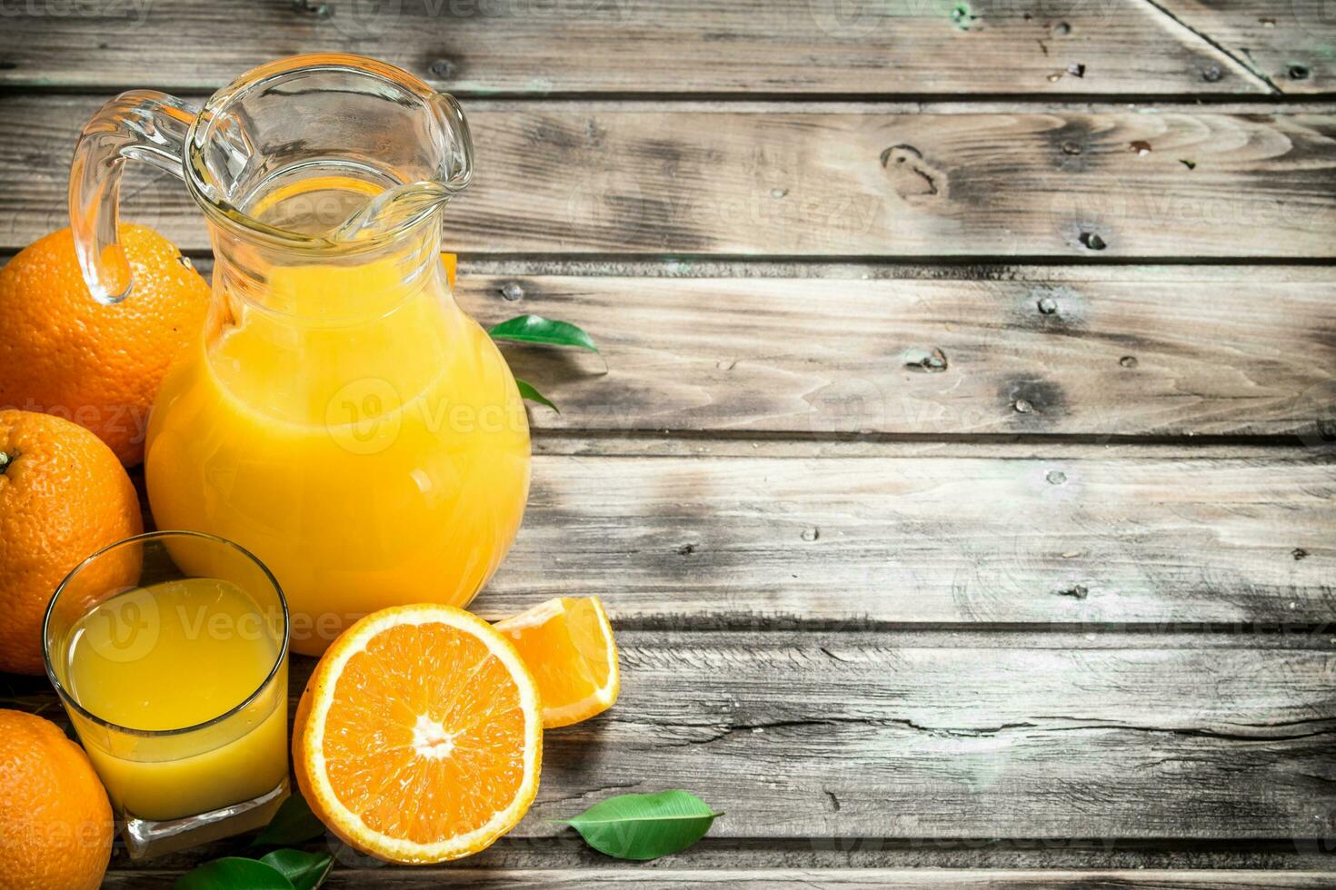 Orange juice in the pitcher. photo
