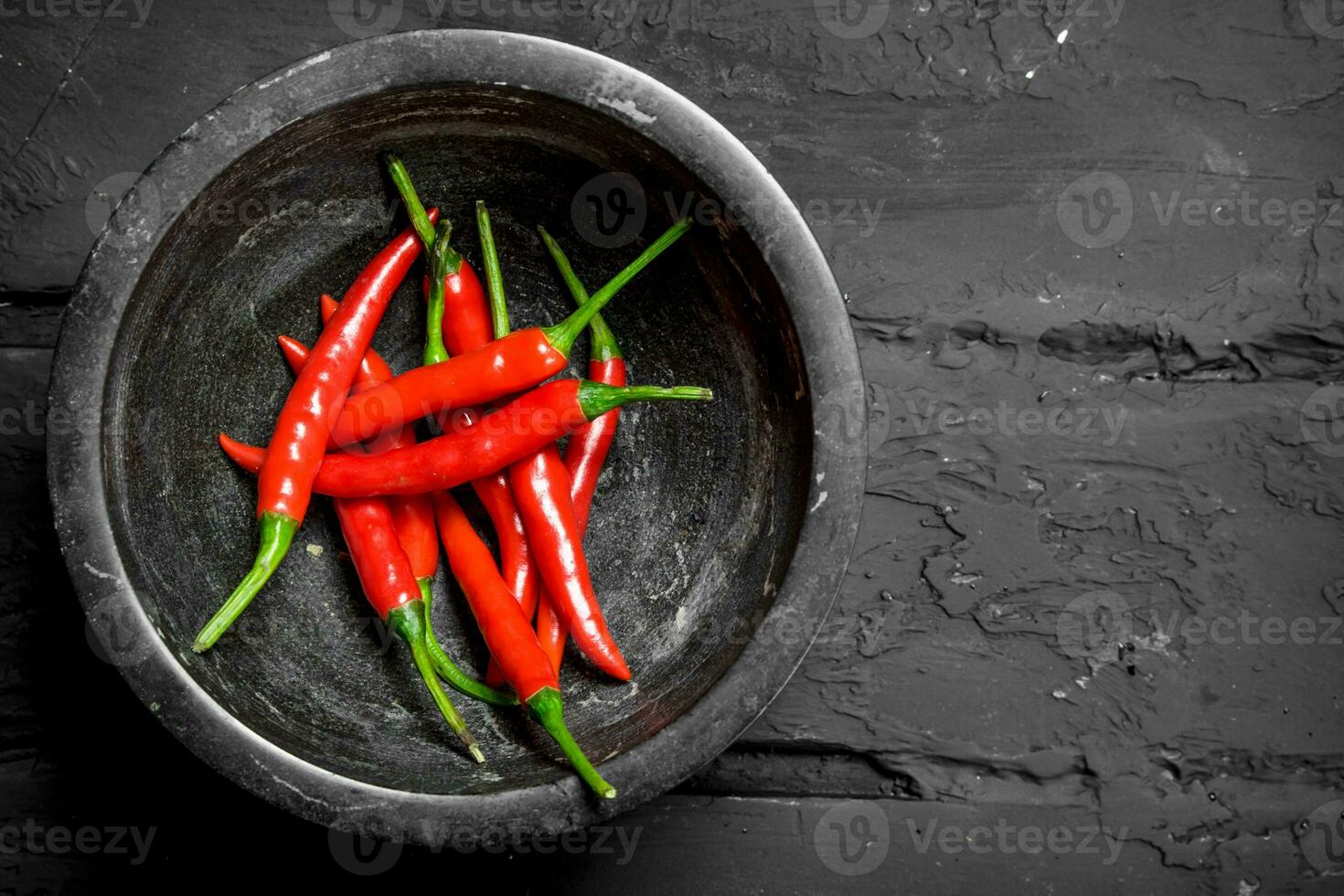 Red hot pepper in bowl. photo