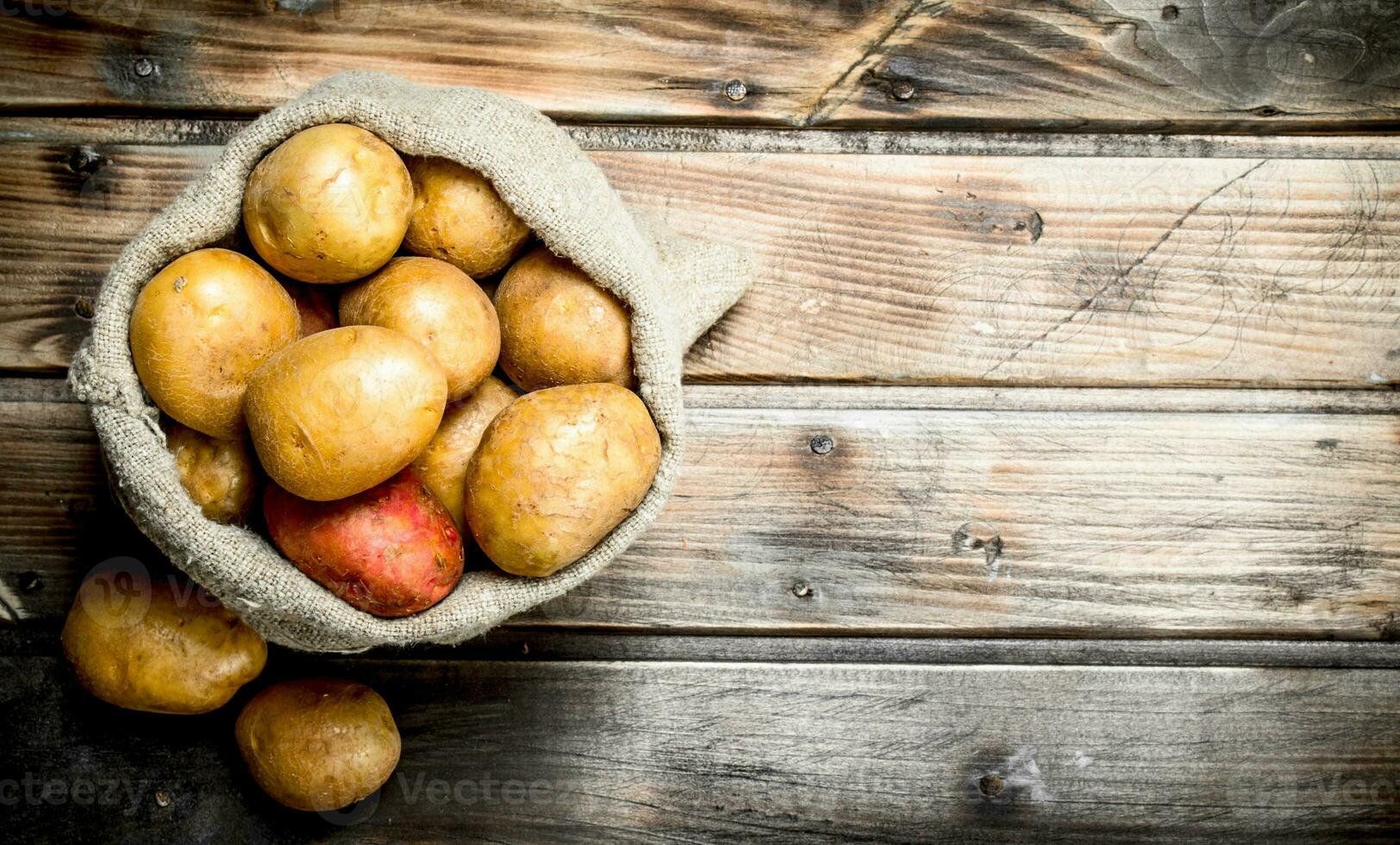 Potatoes in the sack. photo