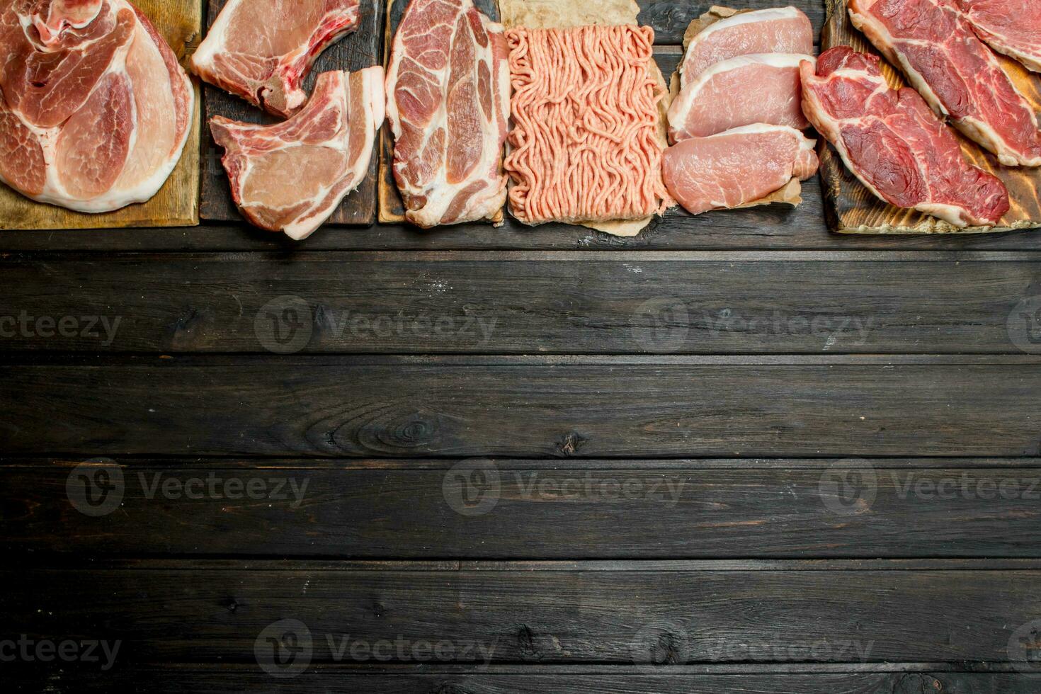 Raw meat. Different kinds of pork and beef meat. photo