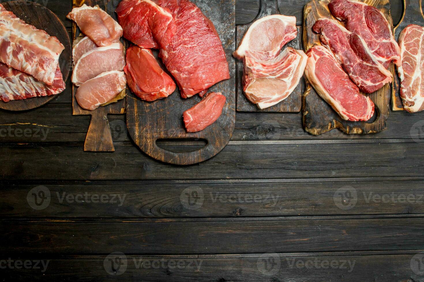 Raw meat. Different kinds of pork and beef meat. photo