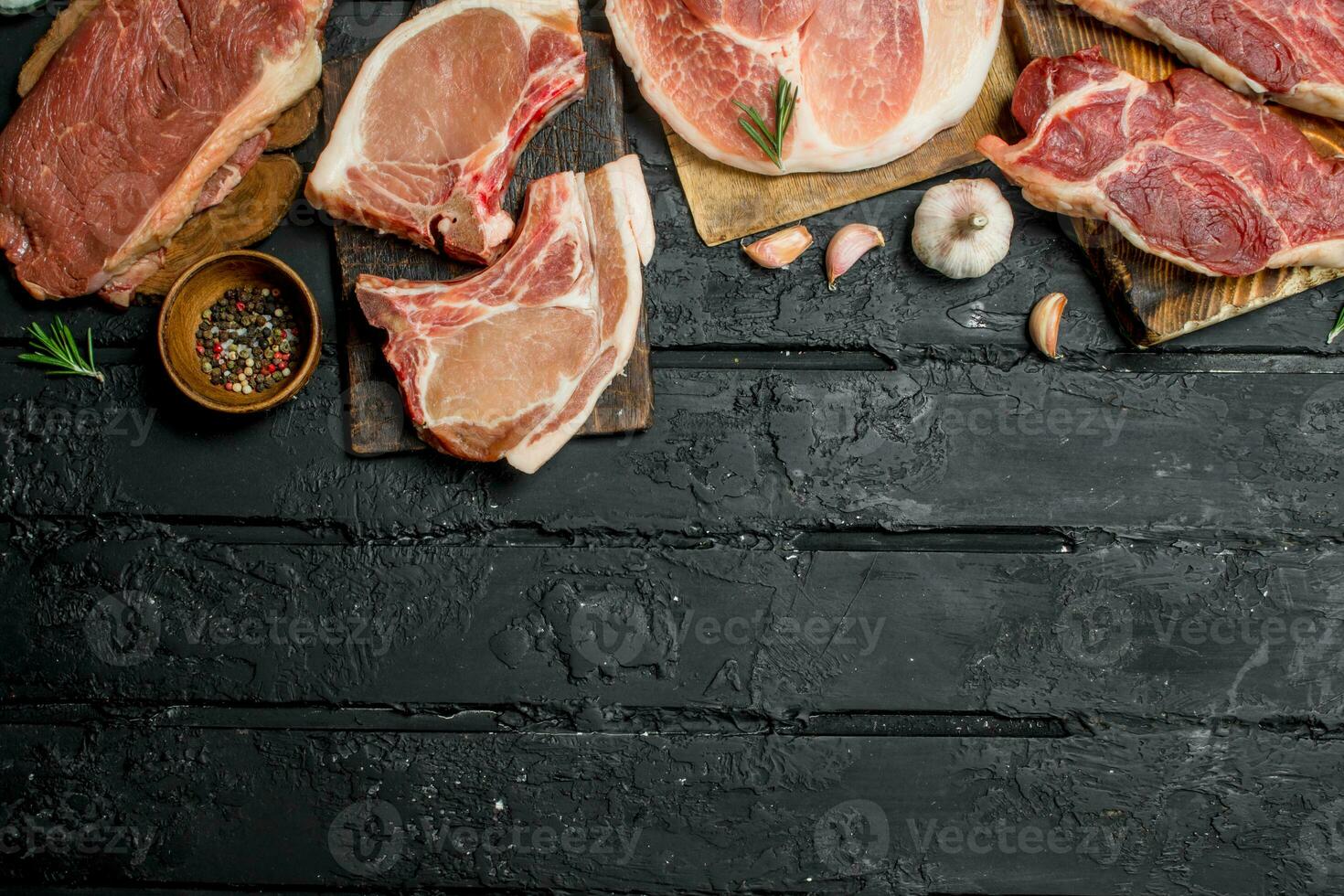 Raw meat. Different kinds of pork and beef meat. photo