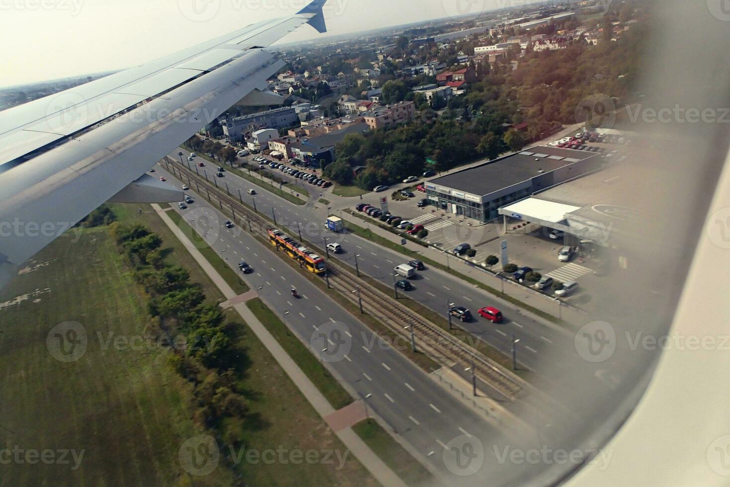 original view of the city of Warsaw in Poland from a flying plane photo