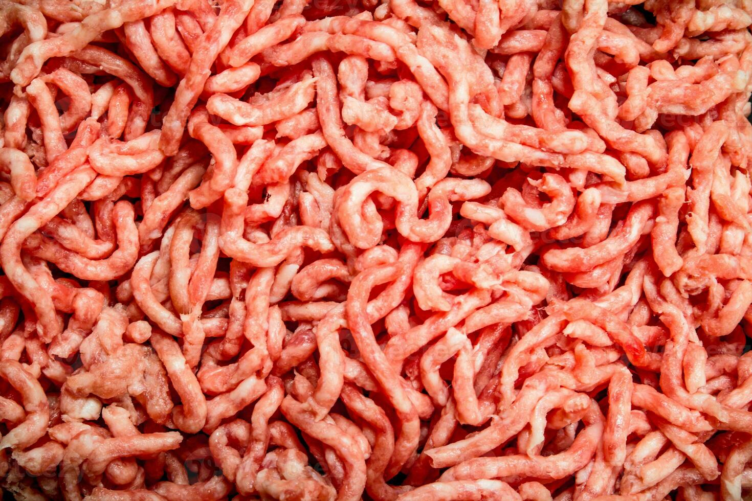 Texture of raw minced meat . photo
