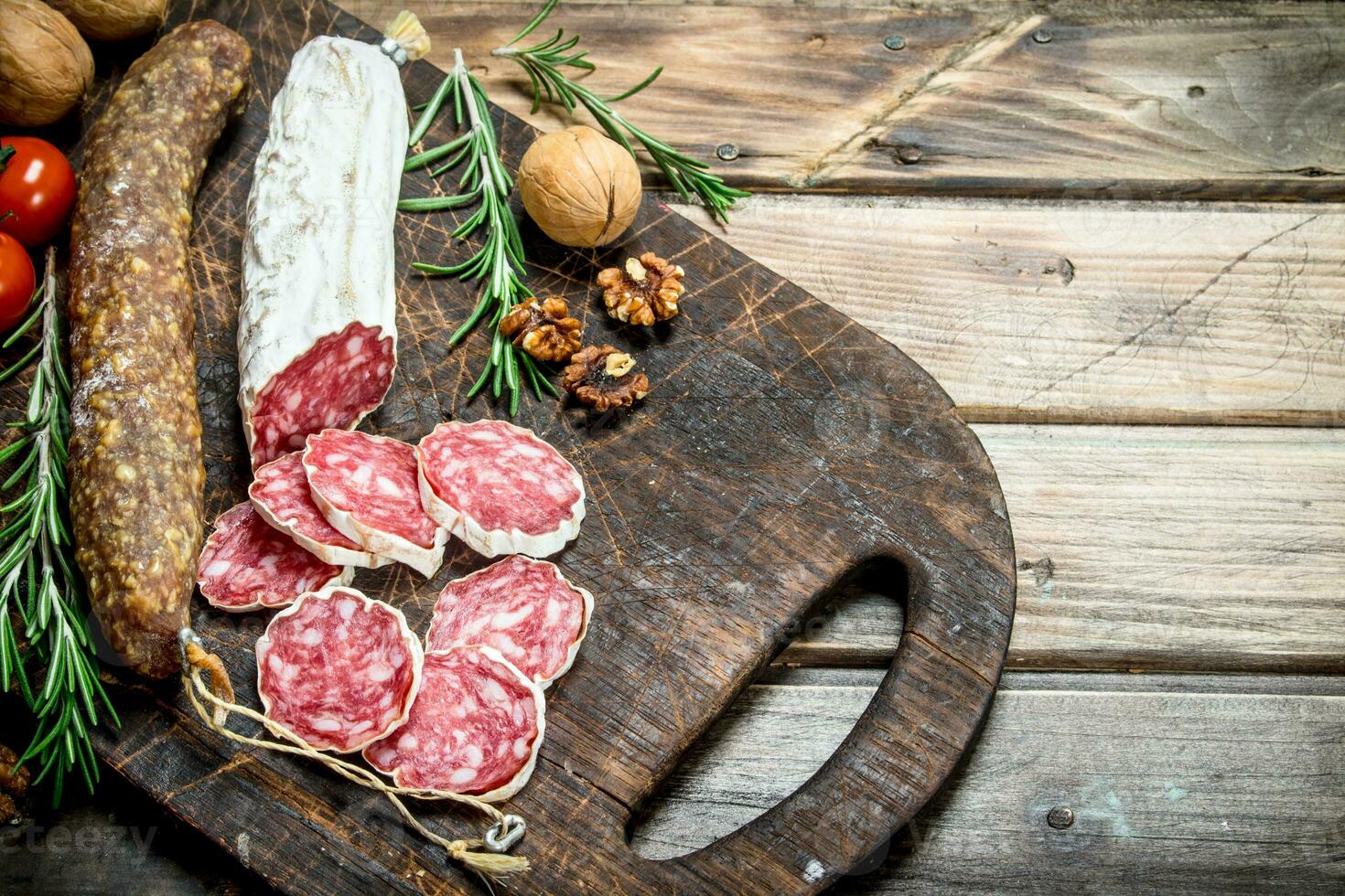 Salami with herbs and spices. photo