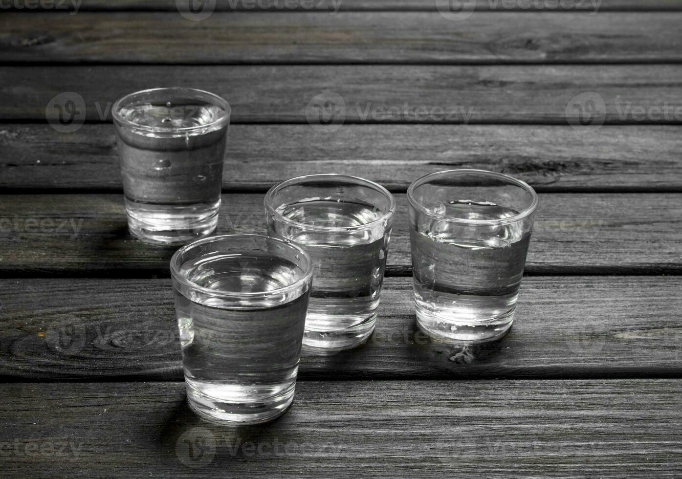 Vodka in a shot glass. photo