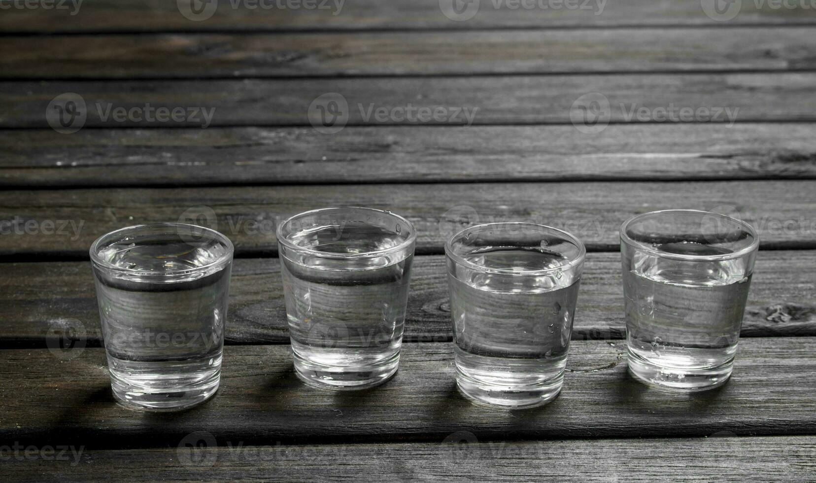 Vodka in a shot glass. photo