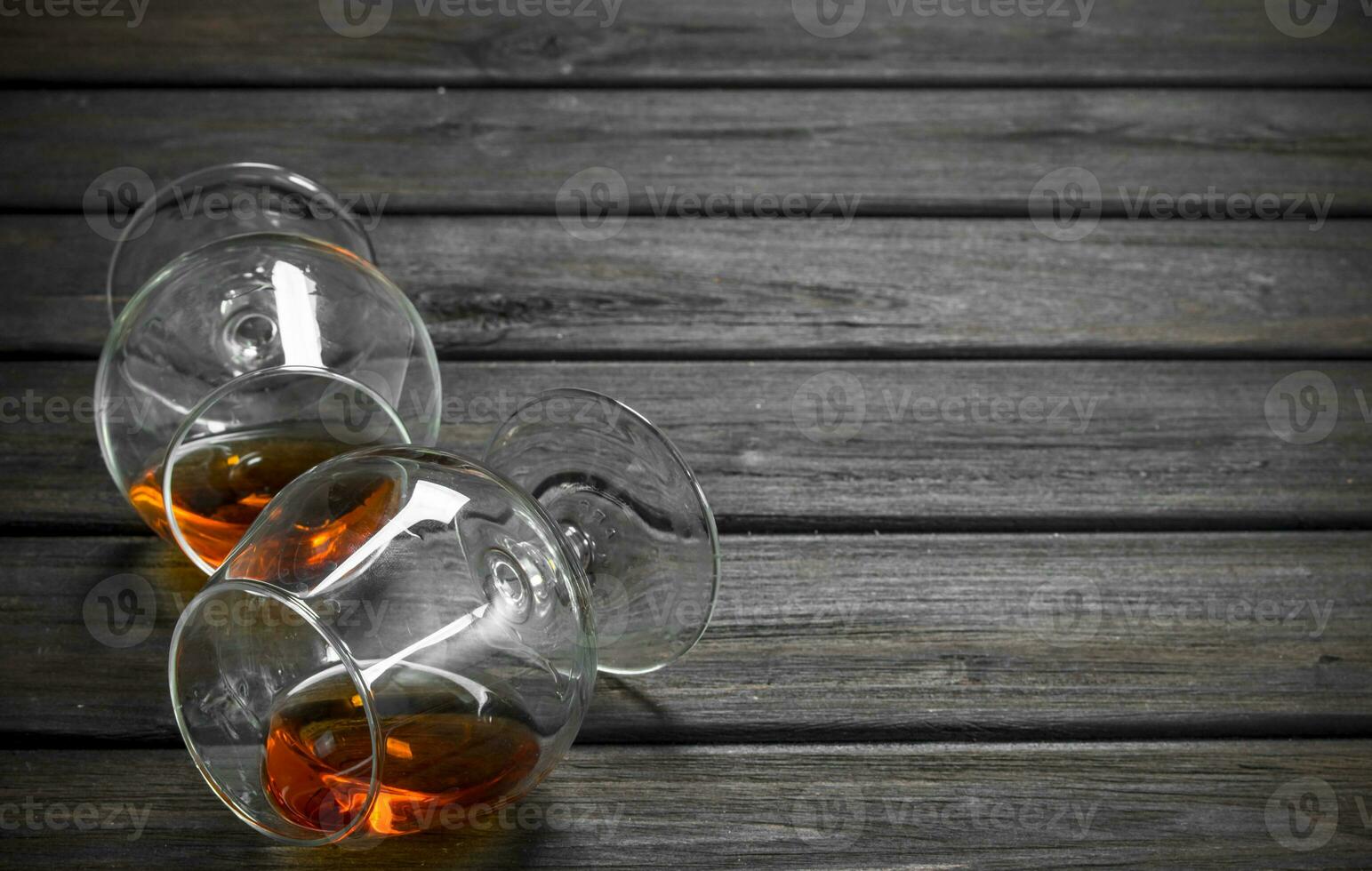 Cognac in a lying glasses. photo
