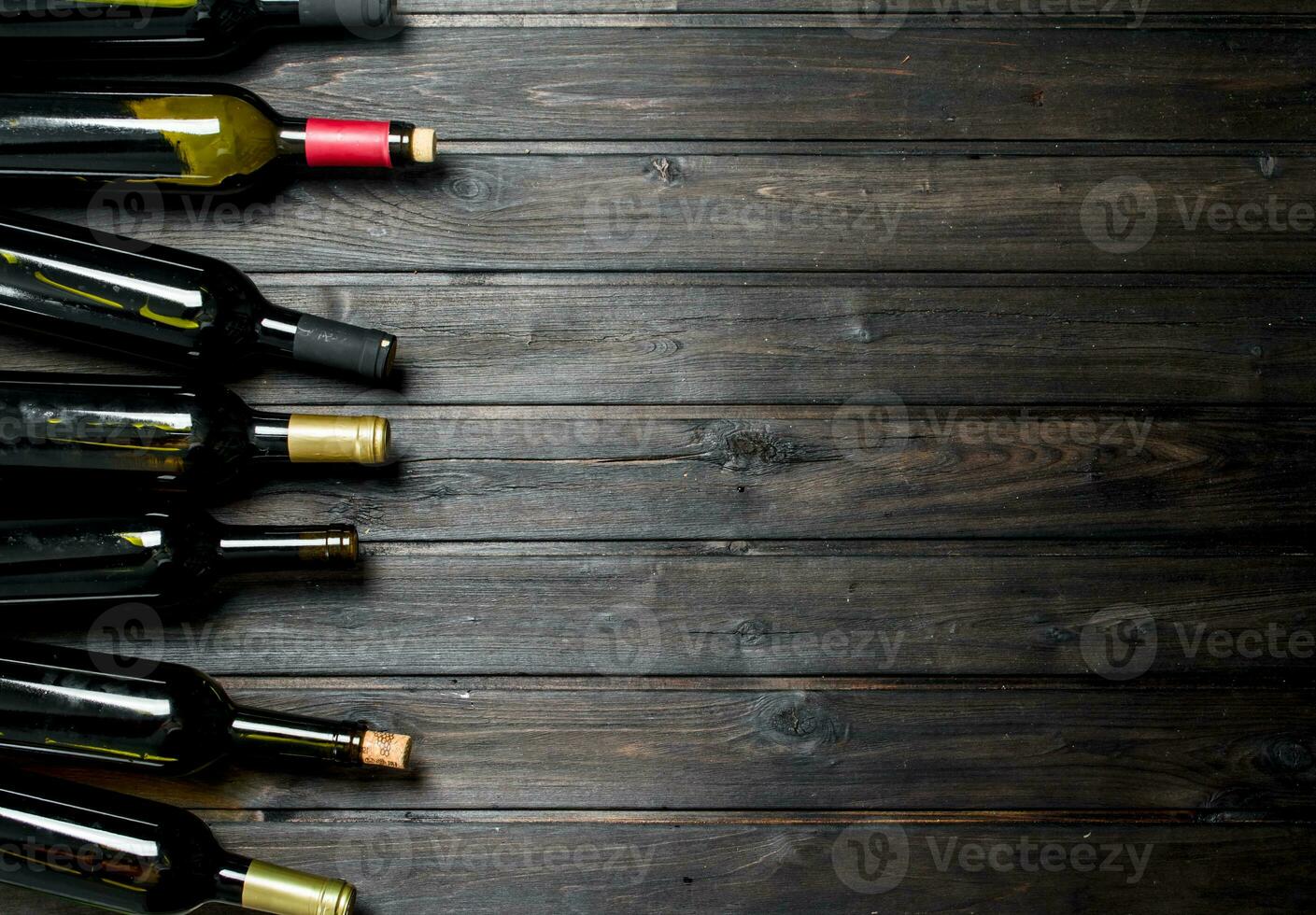 Bottles of white and red wine. photo