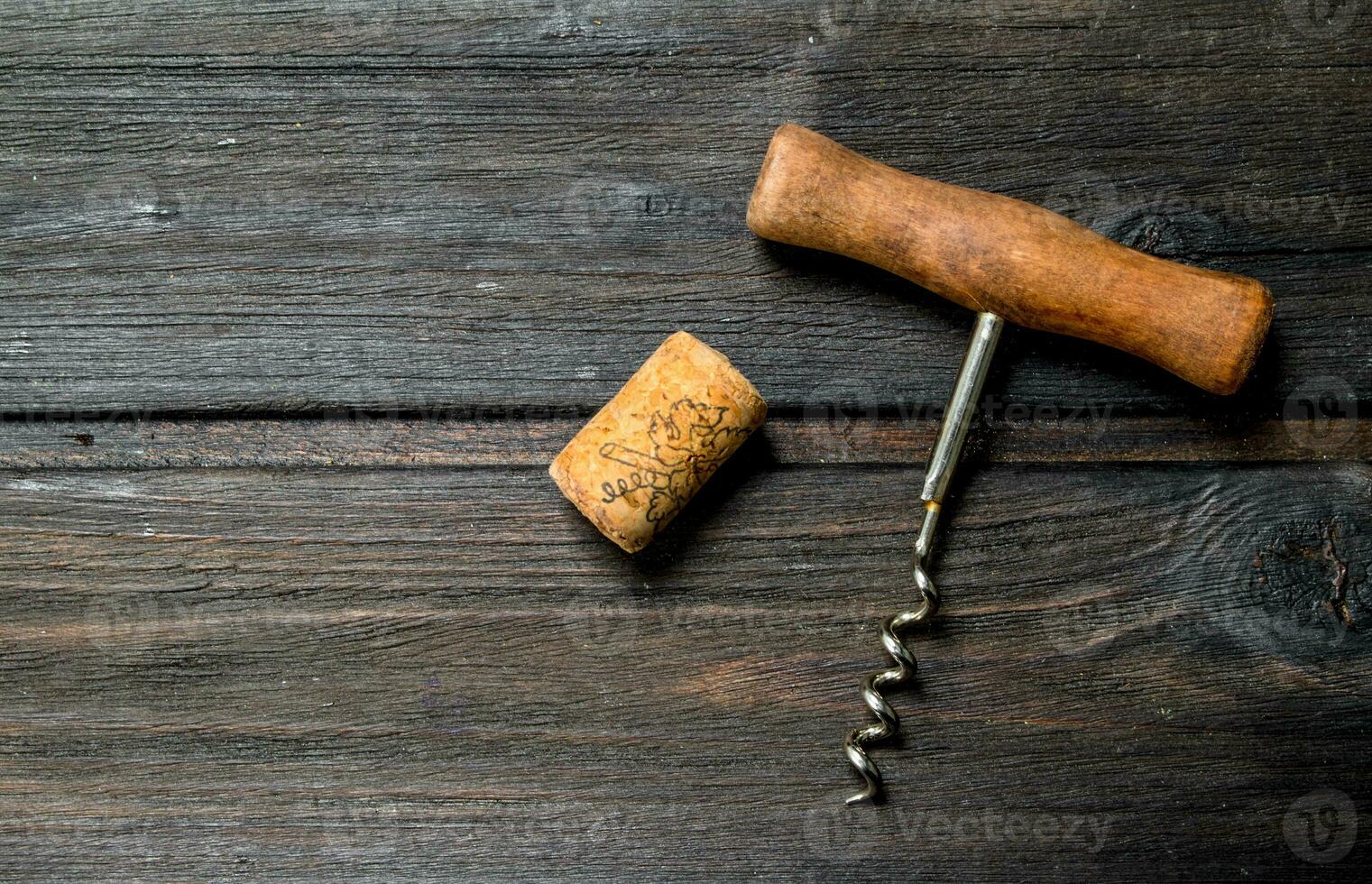 Corkscrew with cork. photo