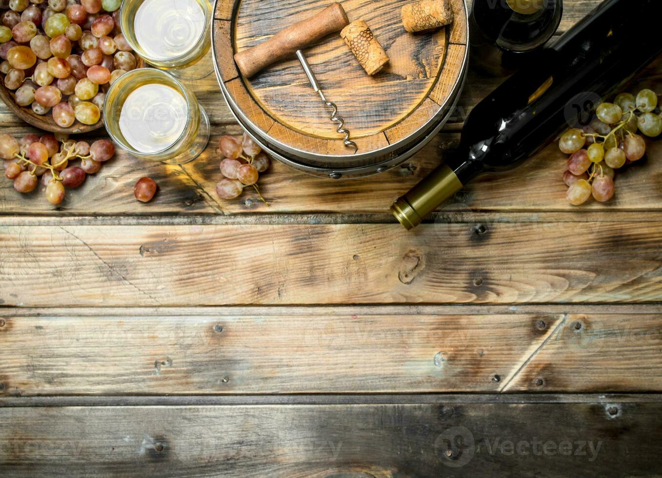 Wine background. White wine in an old barrel. photo