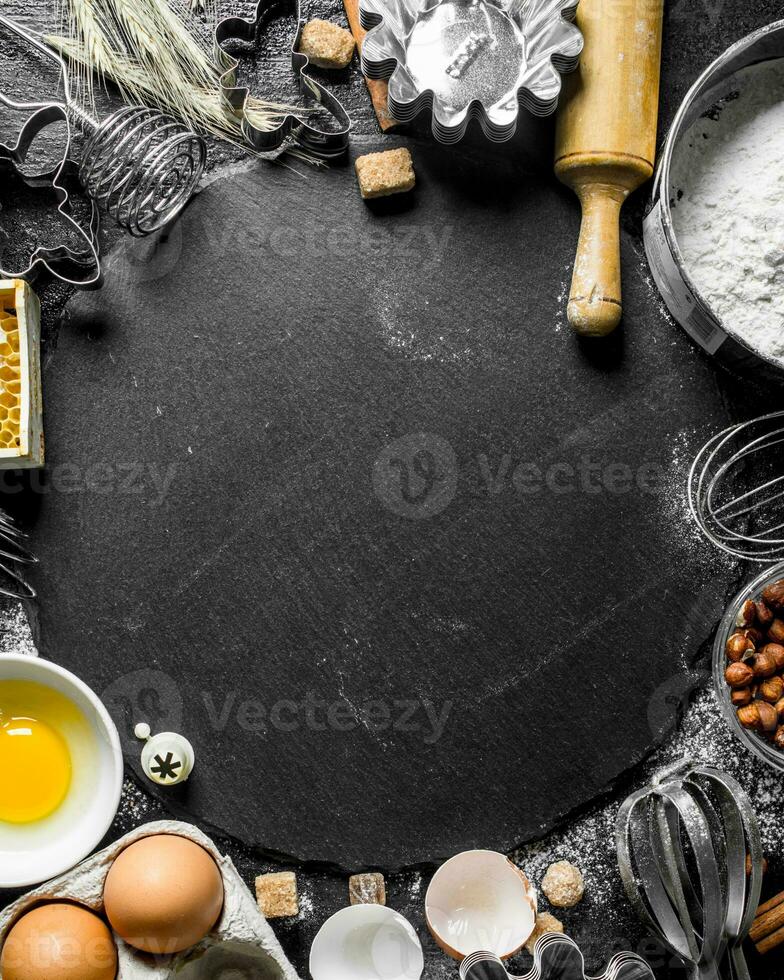 Baking background. Ingredients for the preparation of fresh dough. photo