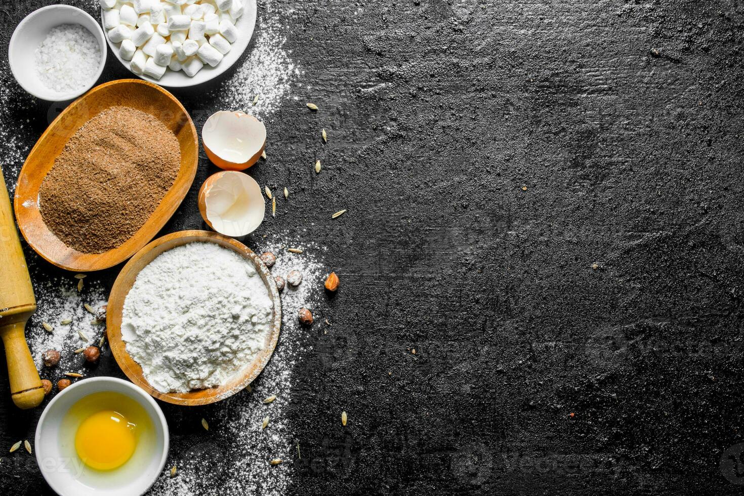 Baking background. Flour with cocoa and egg. photo