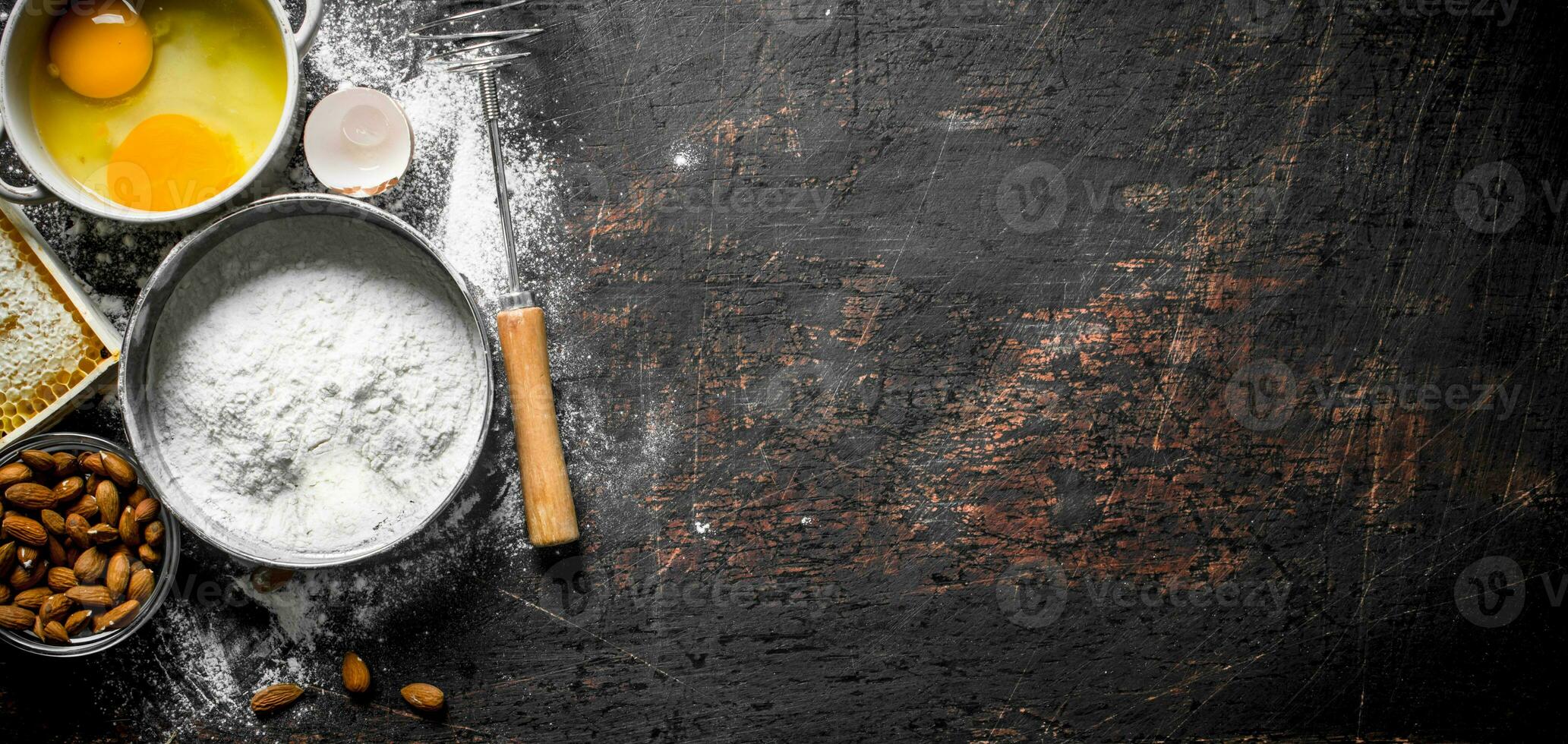 Baking background. Flour with honey, nuts and eggs. photo
