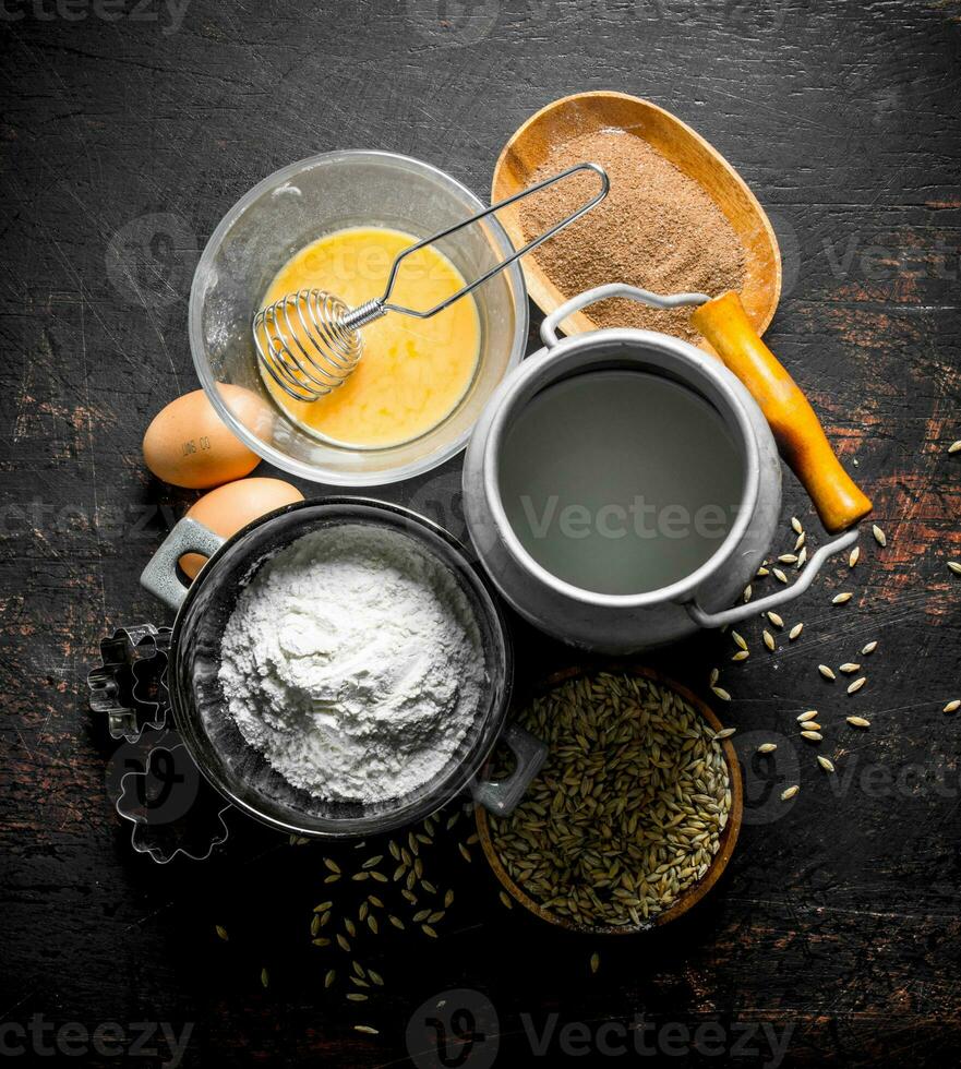 Baking background. Flour with milk, cocoa and grain. photo