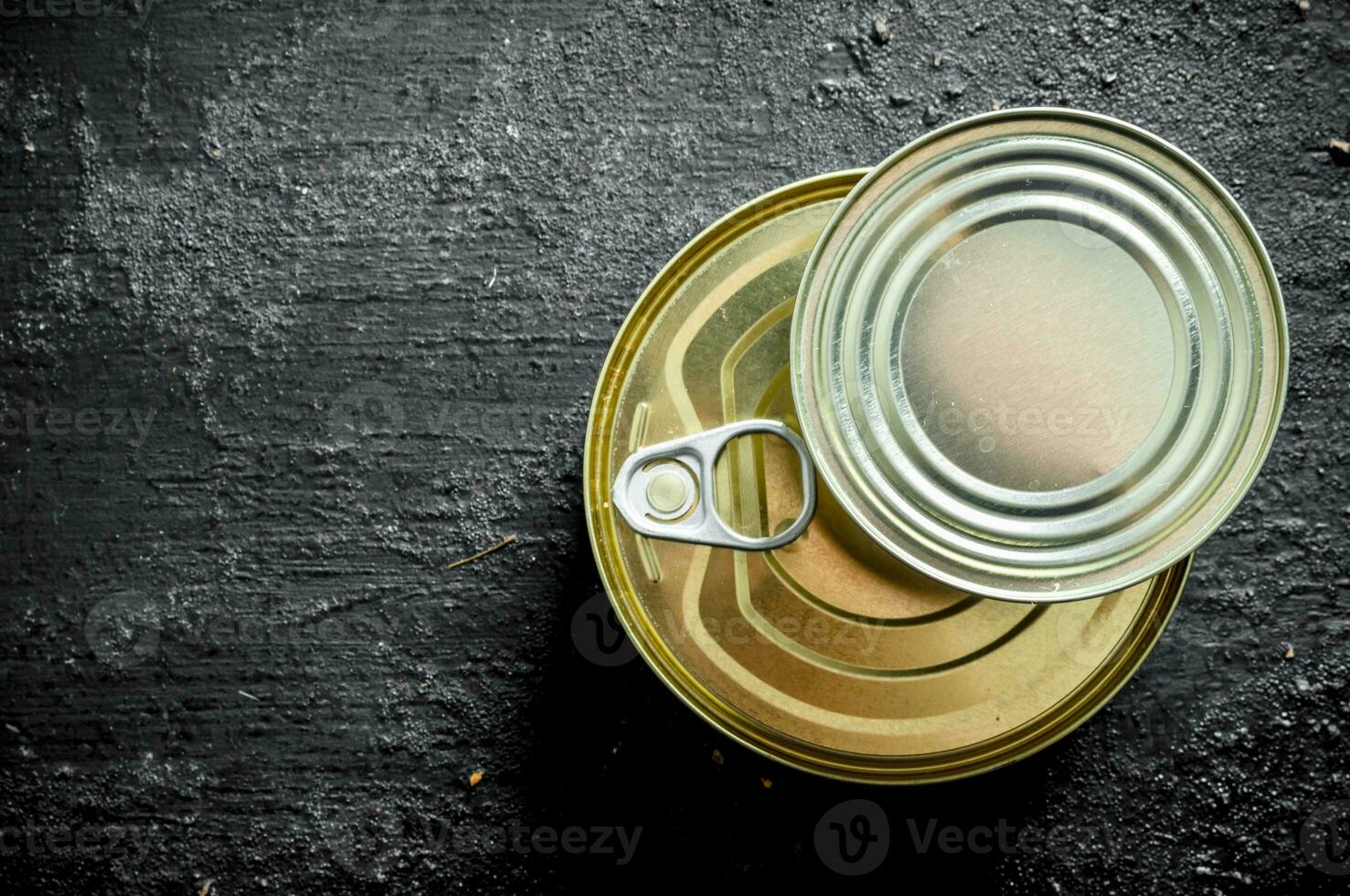 Closed tin can with canned food. photo