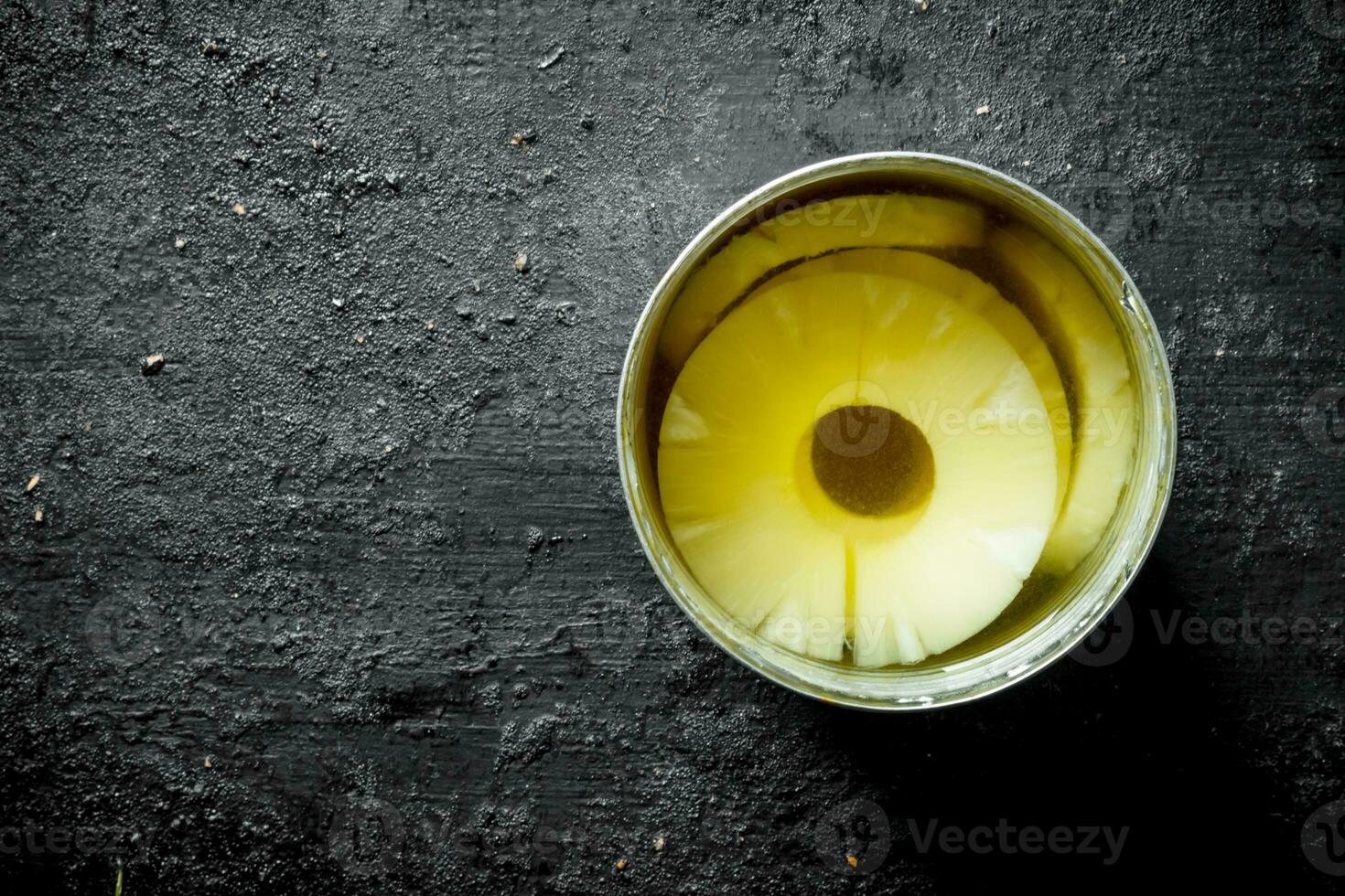 Pineapples in a tin can. photo