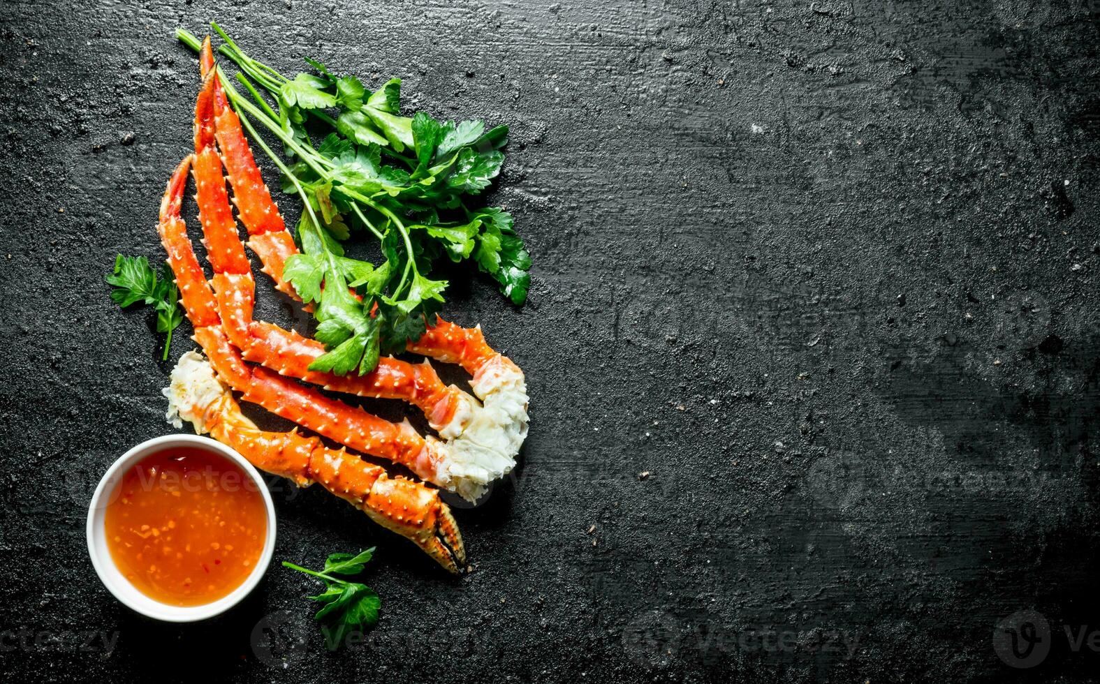 Fresh crab with herbs and sauce. photo