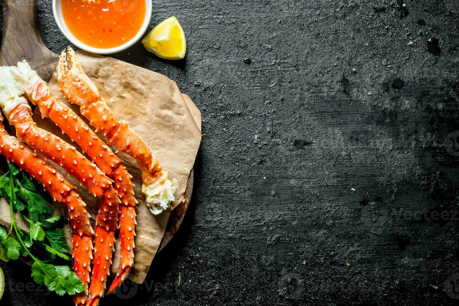 Crab with sauce and herbs. photo