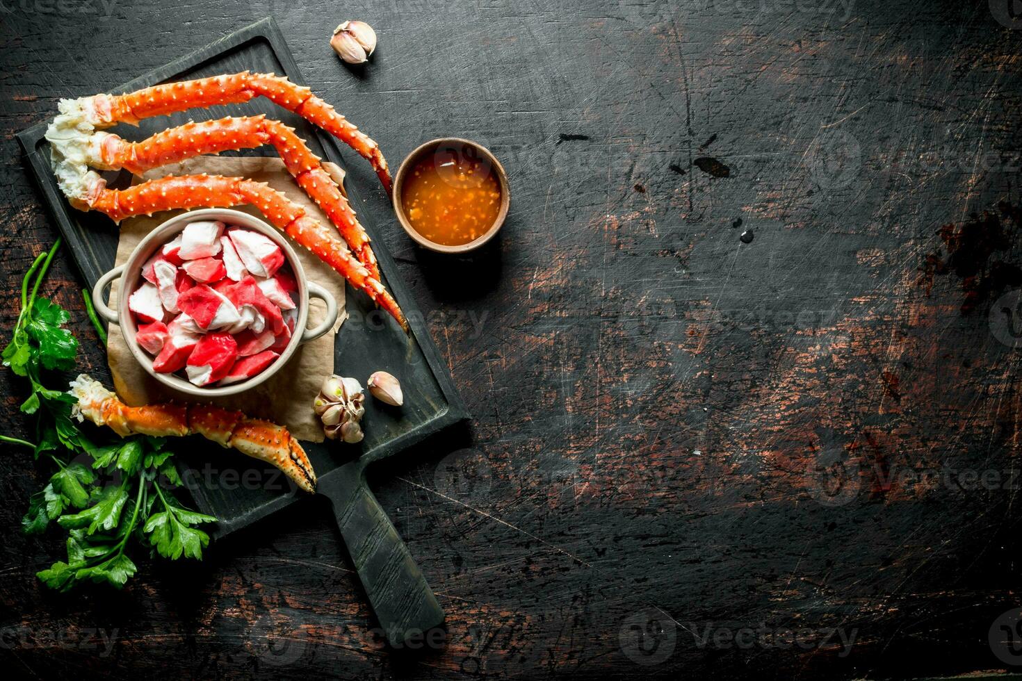 Crab meat with parsley and garlic cloves. photo