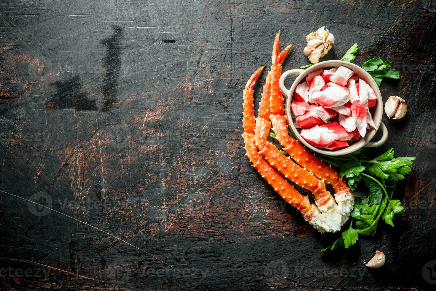 Crab meat with parsley and garlic cloves. photo