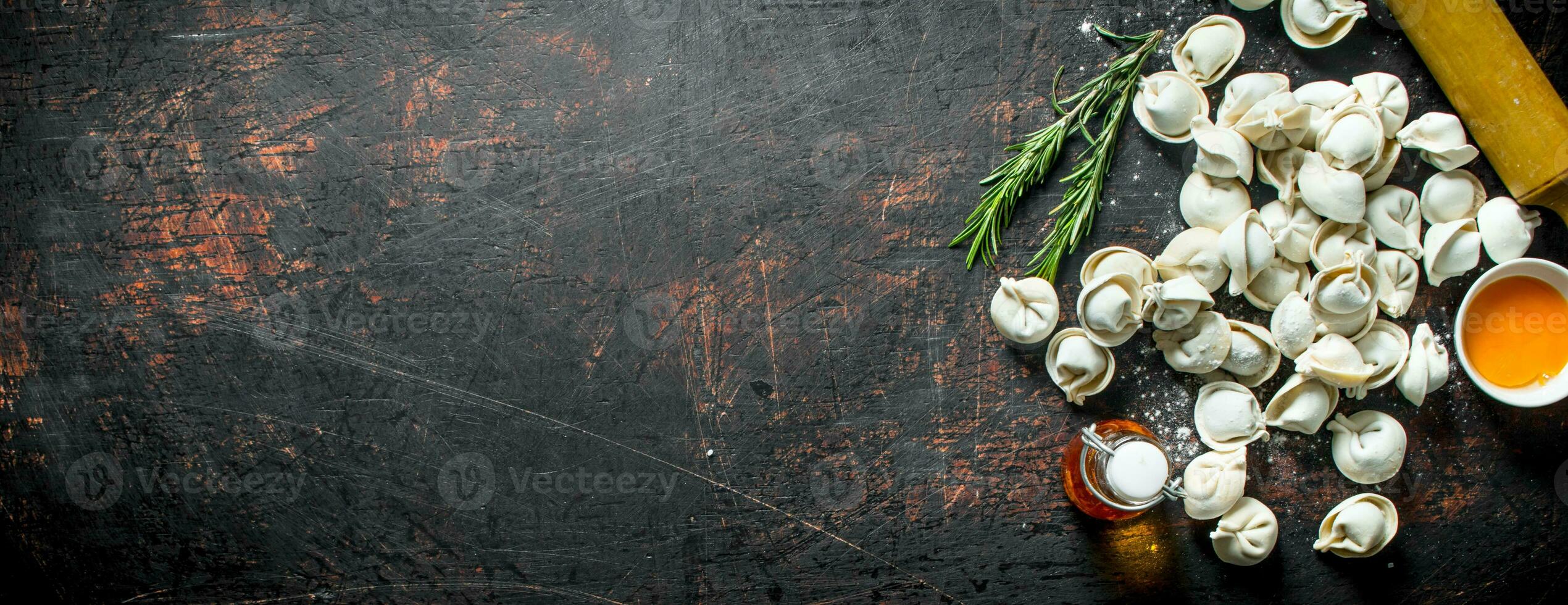 Raw dumpling. Preparation homemade meat dumplings. photo