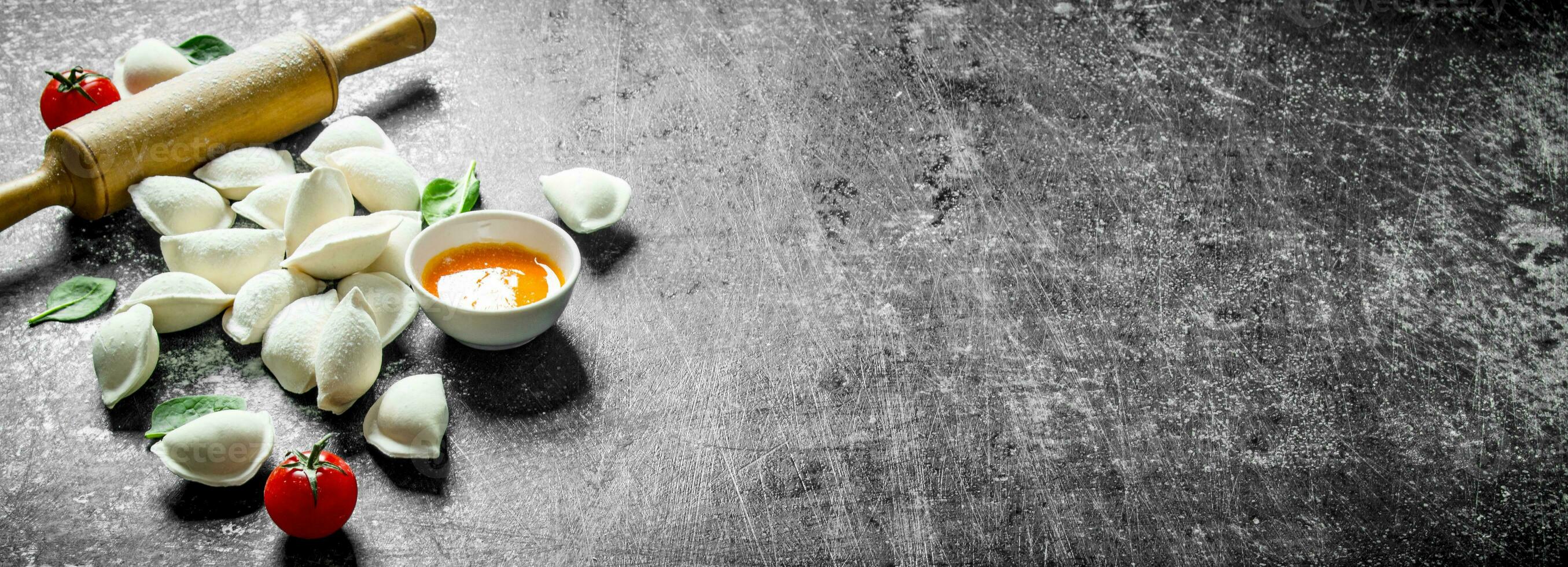 Raw dumpling. Preparation dumplings with potatoes. photo