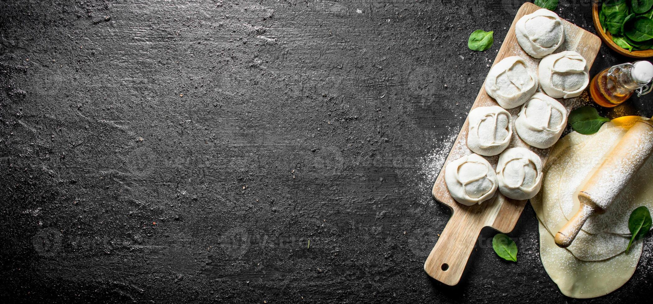 Raw manta dumpling on cutting Board. photo