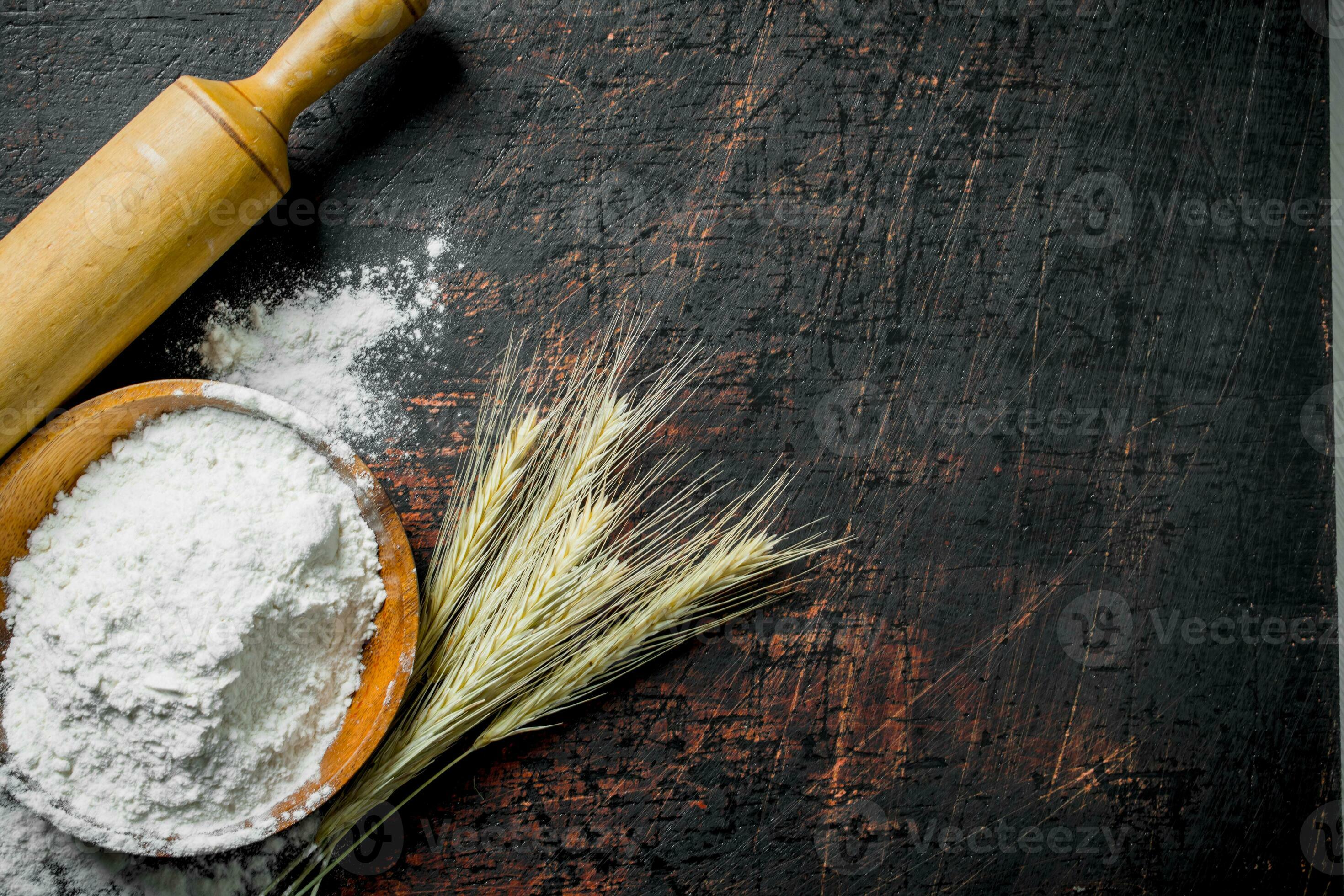 Flour with spikes and a rolling pin. 32014255 Stock Photo at Vecteezy