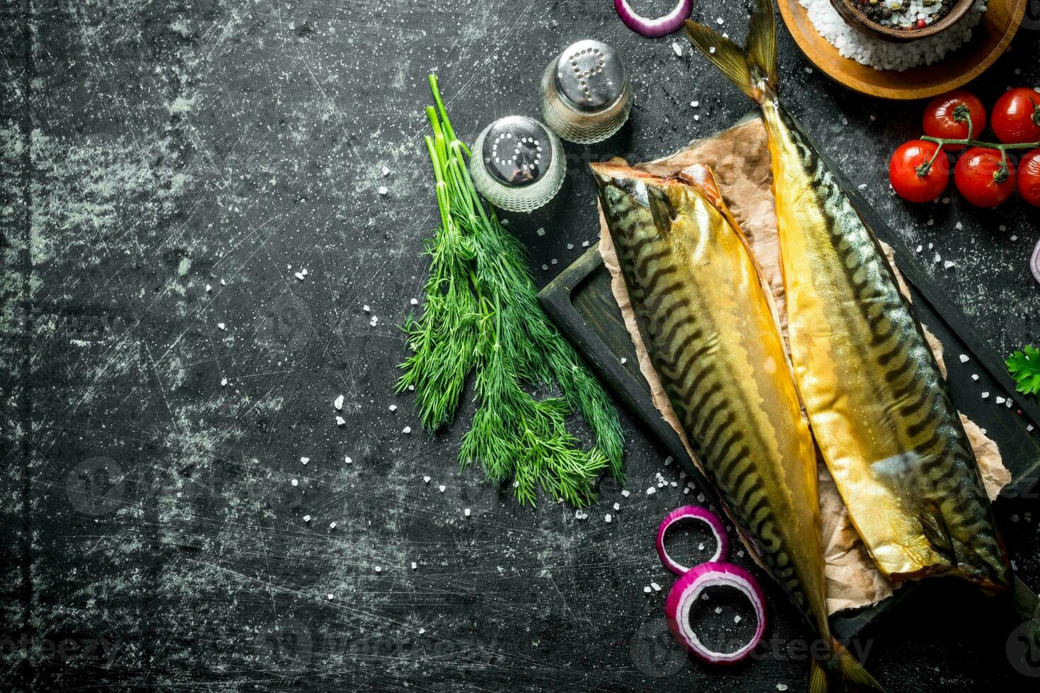 Smoked mackerel with spices and dill. photo
