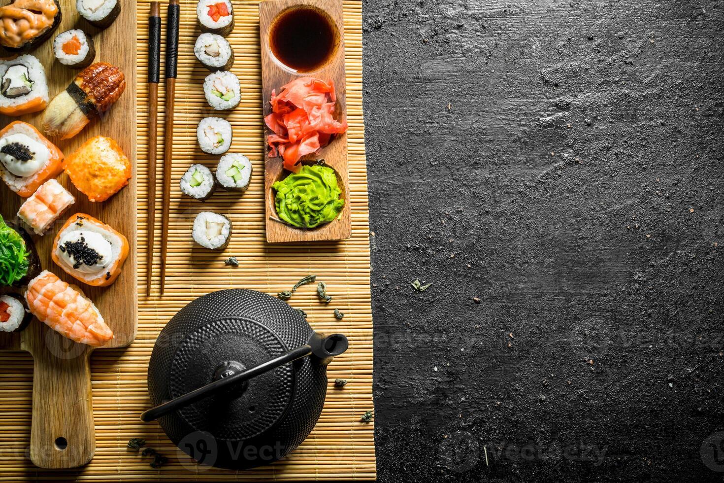 Traditional Japanese sushi, maki and rolls on a napkin. photo