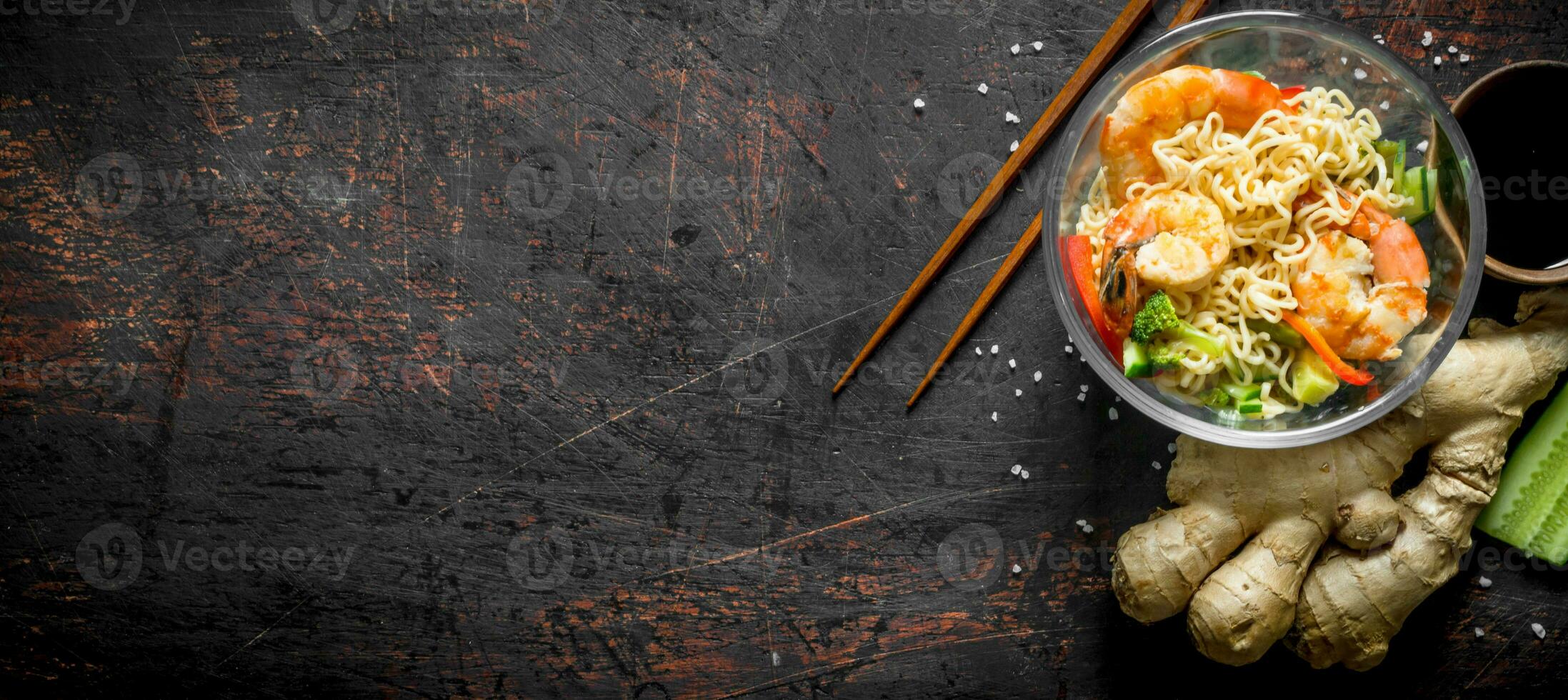Instant noodles with vegetables, shrimp and fresh ginger. photo