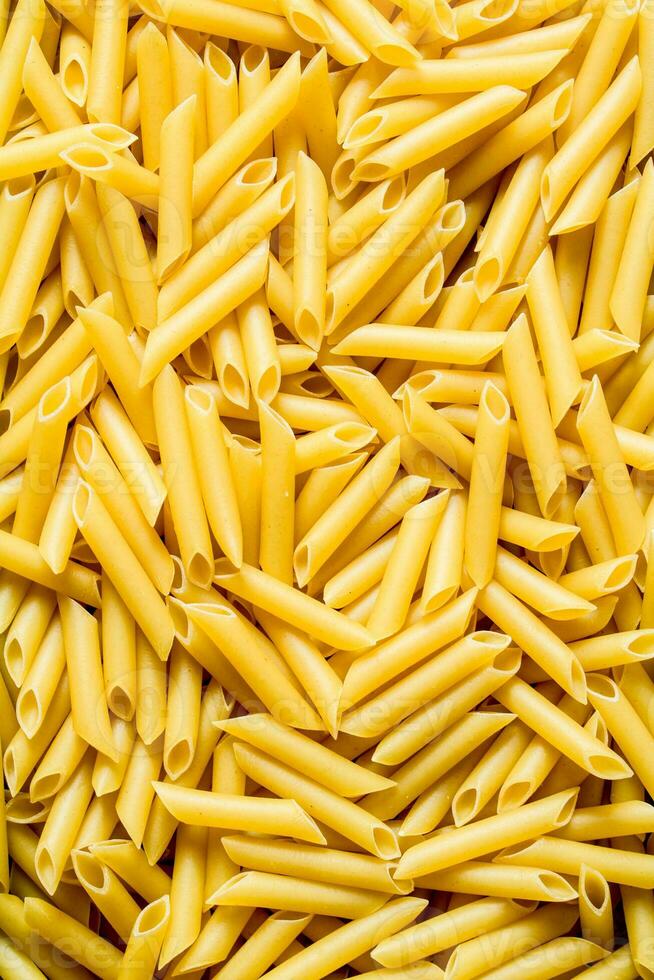 Pasta background. Dry pasta. photo