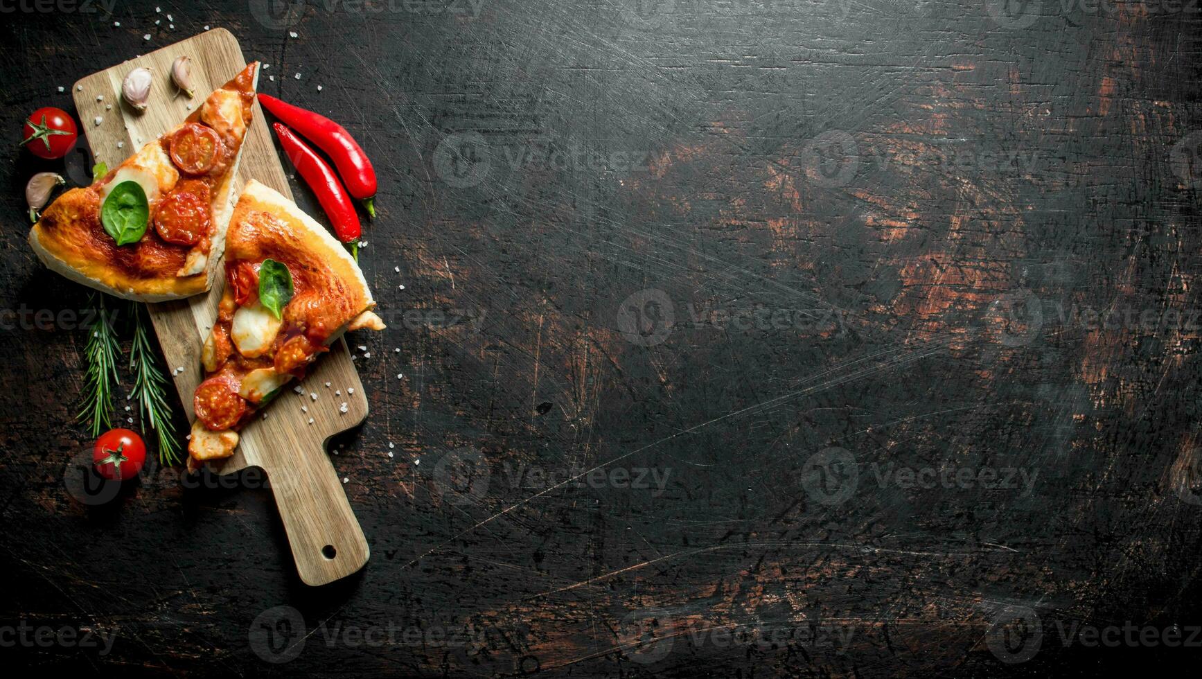 Slices of homemade pizza with sausage and cheese. photo