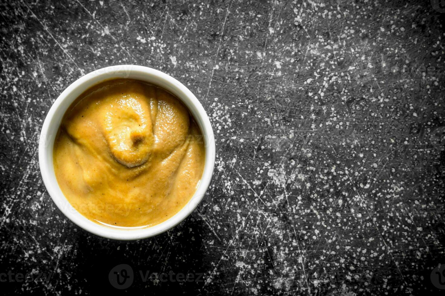 Mustard in the bowl. photo