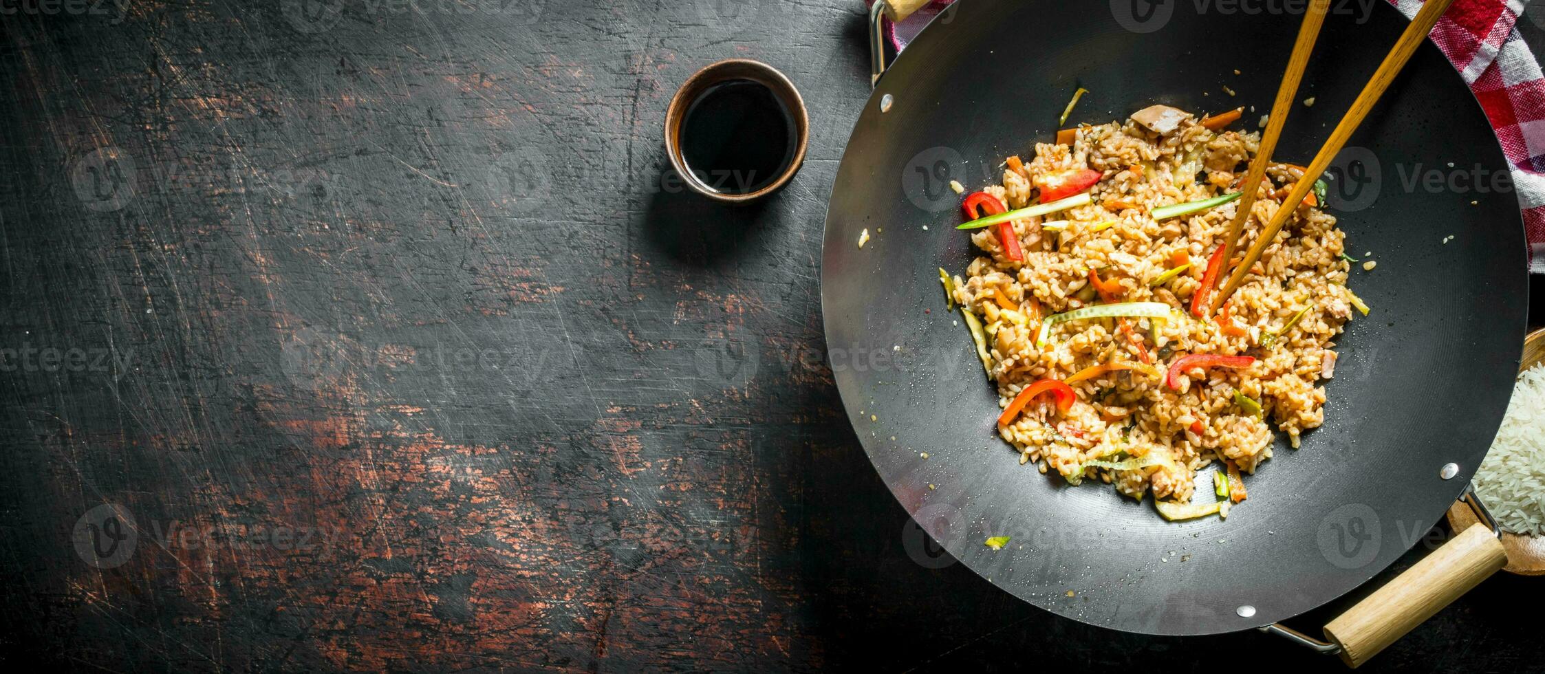 Fragrant wok rice with chicken and vegetables. photo