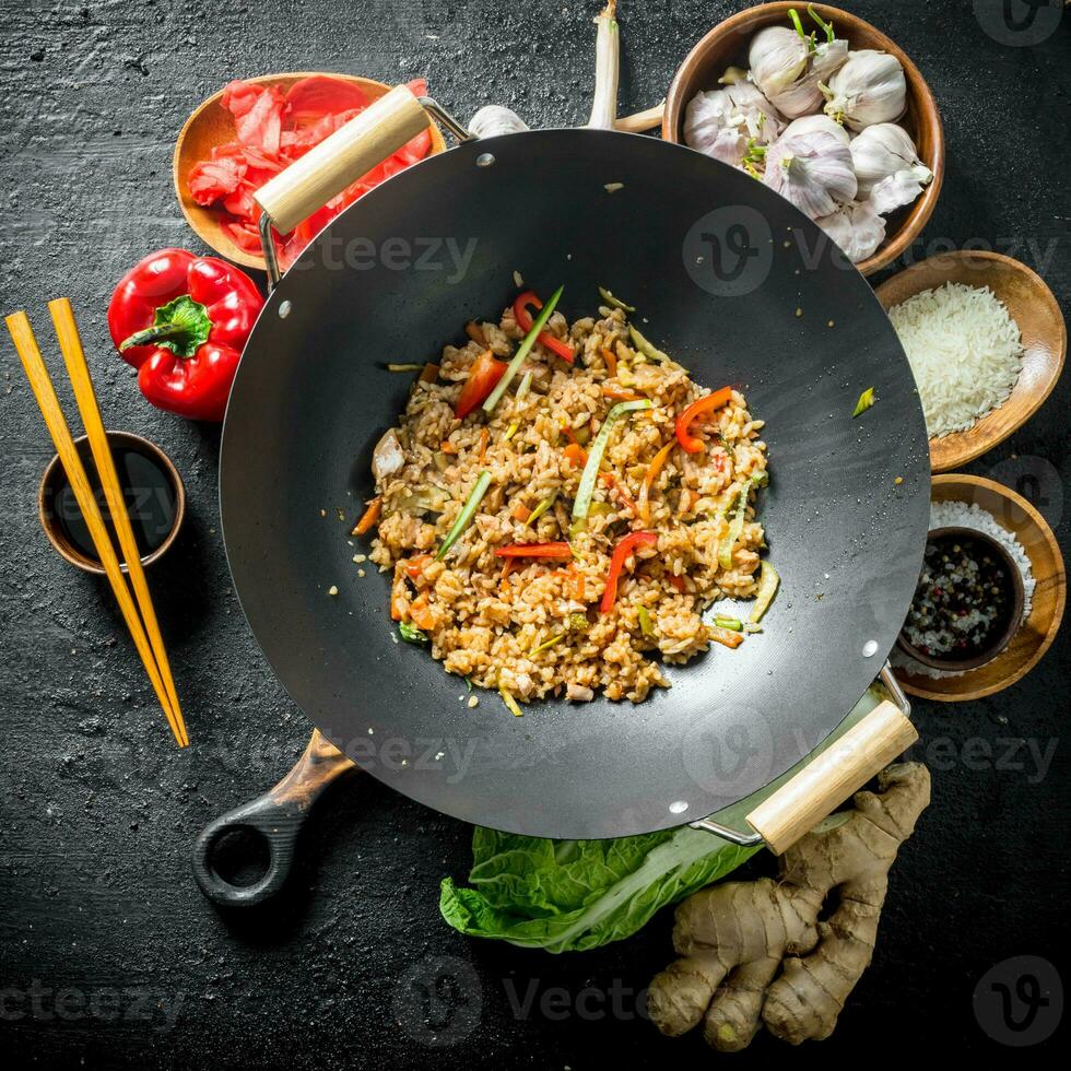 Chinese wok. Ingredients for cooking delicious Asian rice. photo
