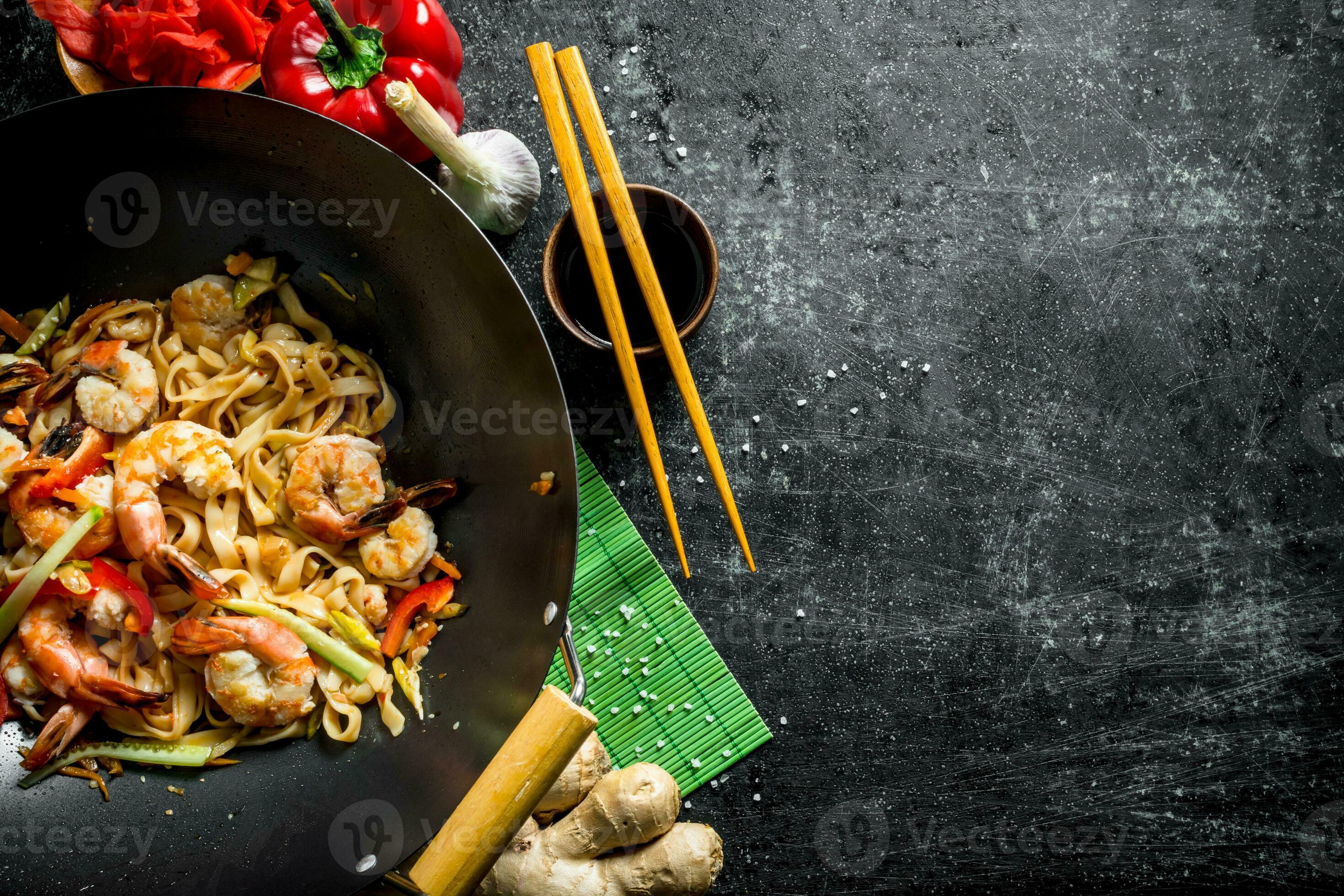 Delicious Chinese Udon noodles with shrimp, sauce and vegetables