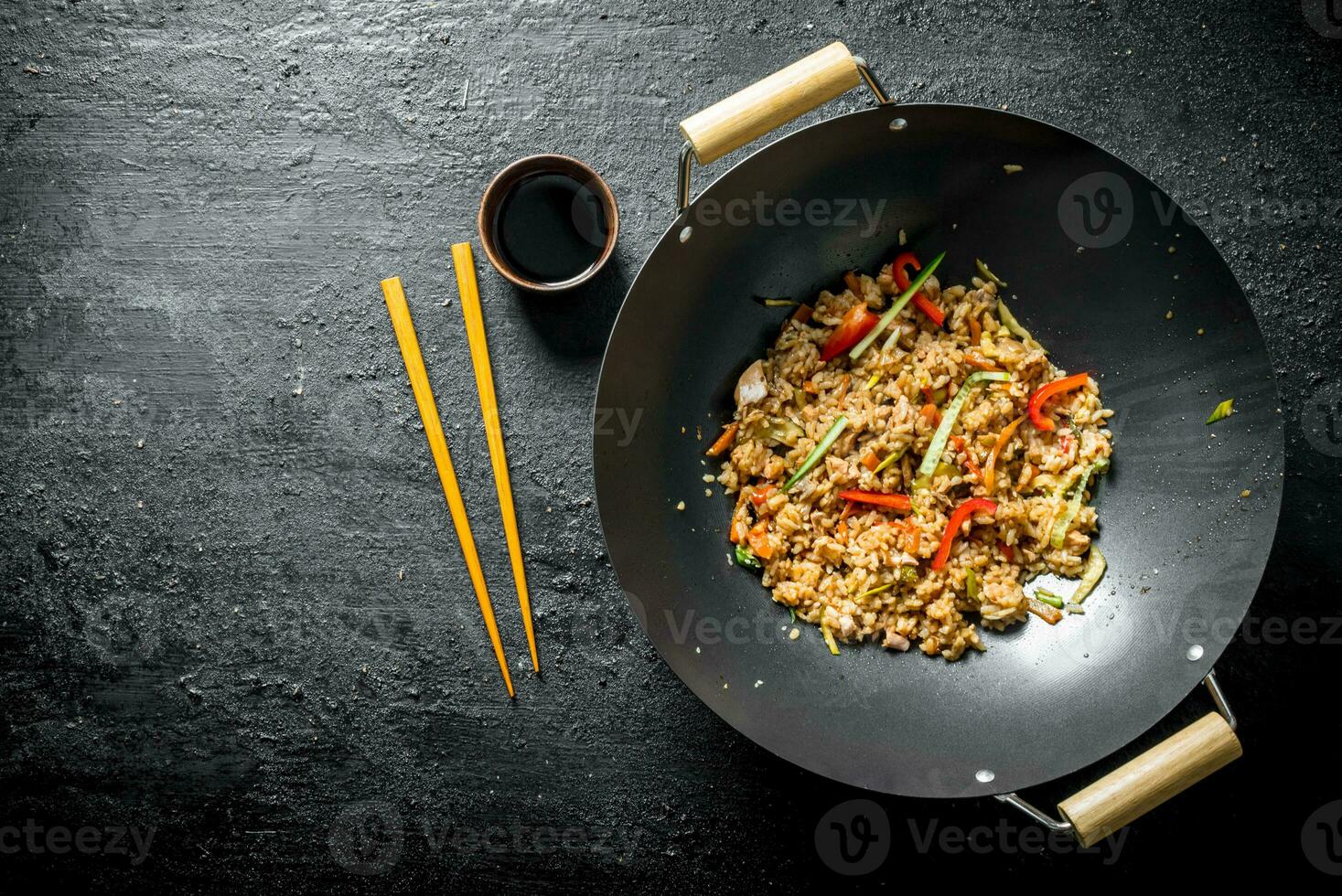 Fragrant wok rice with chicken and vegetables. photo