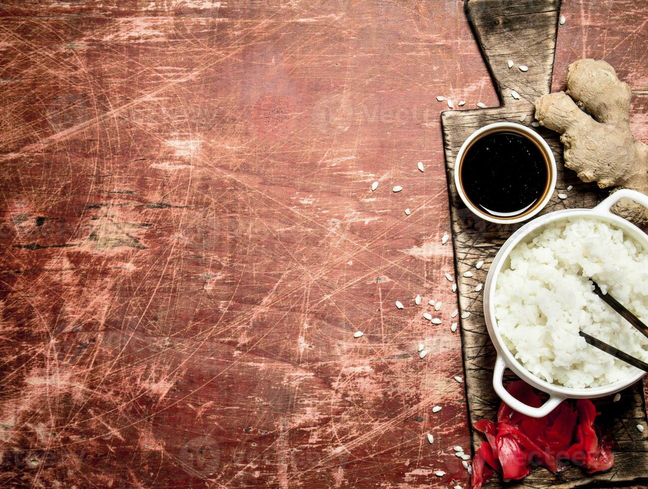 Asian food. Rice with soy sauce and pickled ginger . photo