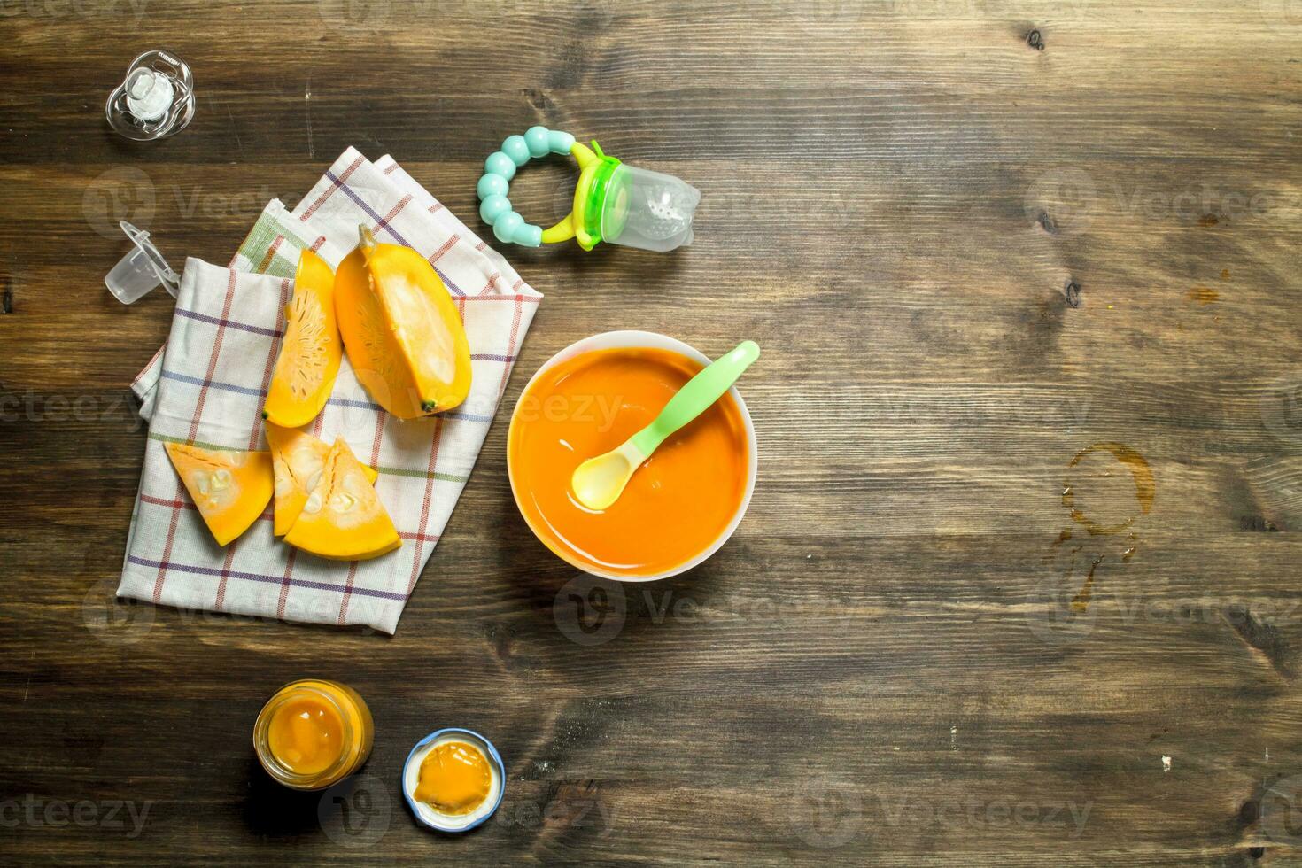 Baby food. Baby puree from fresh pumpkin. photo