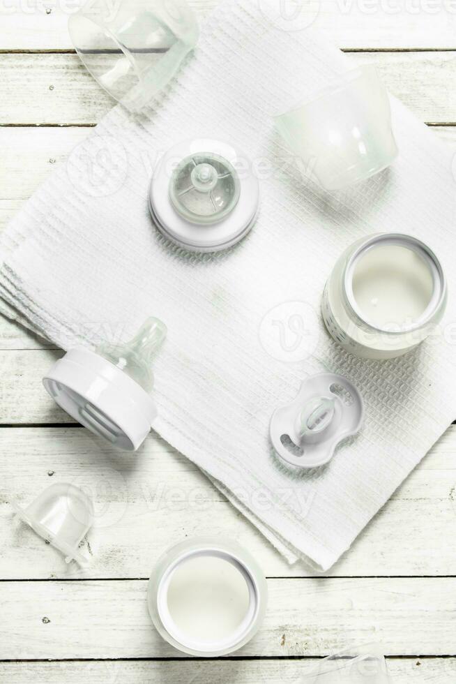 Baby food. Baby milk in small bottle. photo
