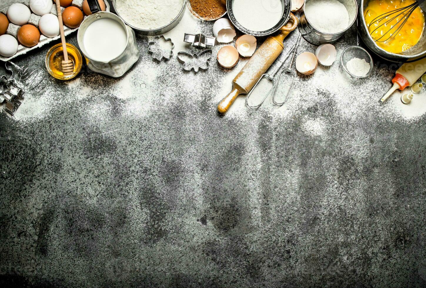 Baking background. A variety of ingredients for baking on rustic background. photo