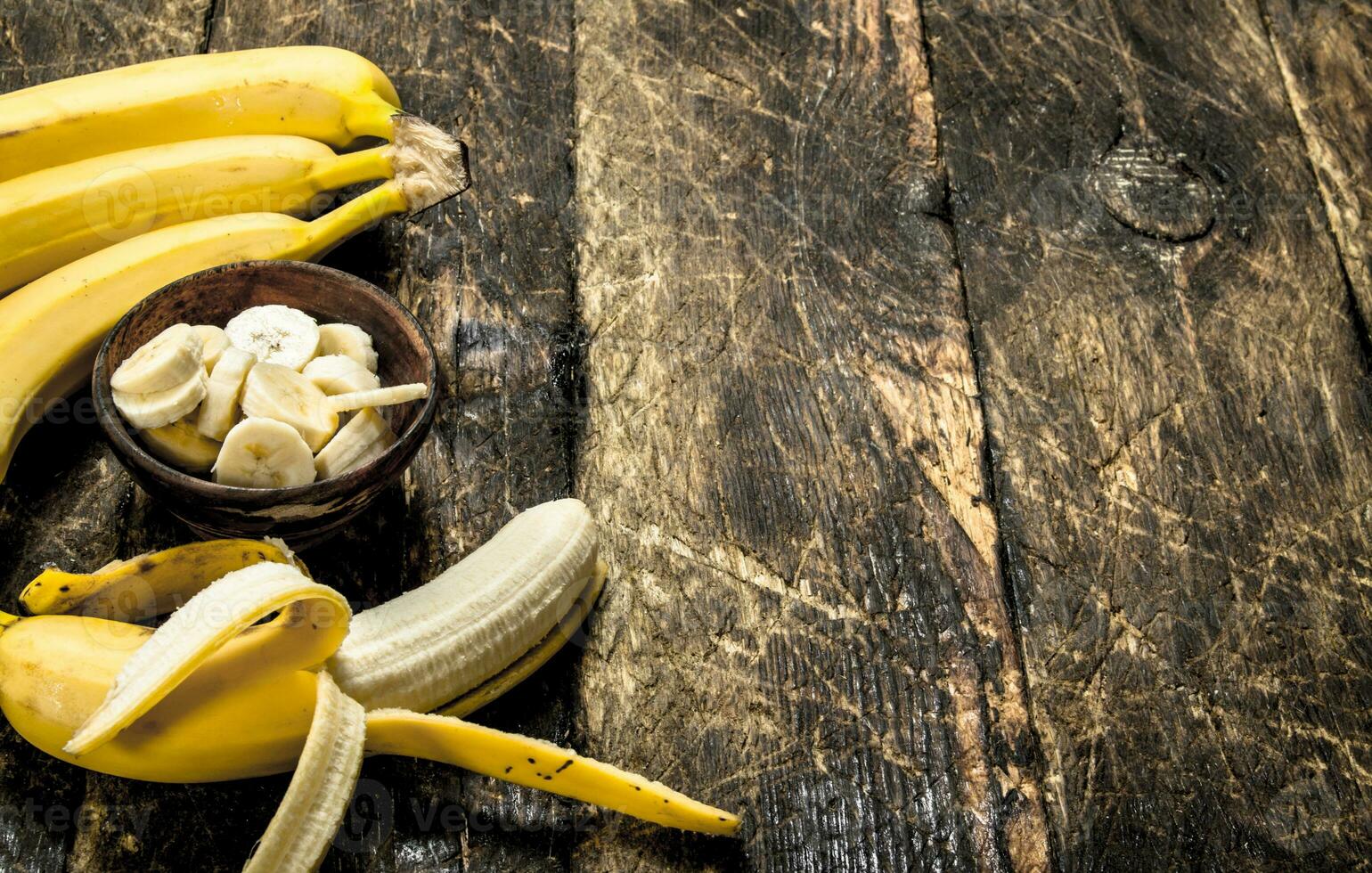 Sliced ripe banana in a bowl. photo